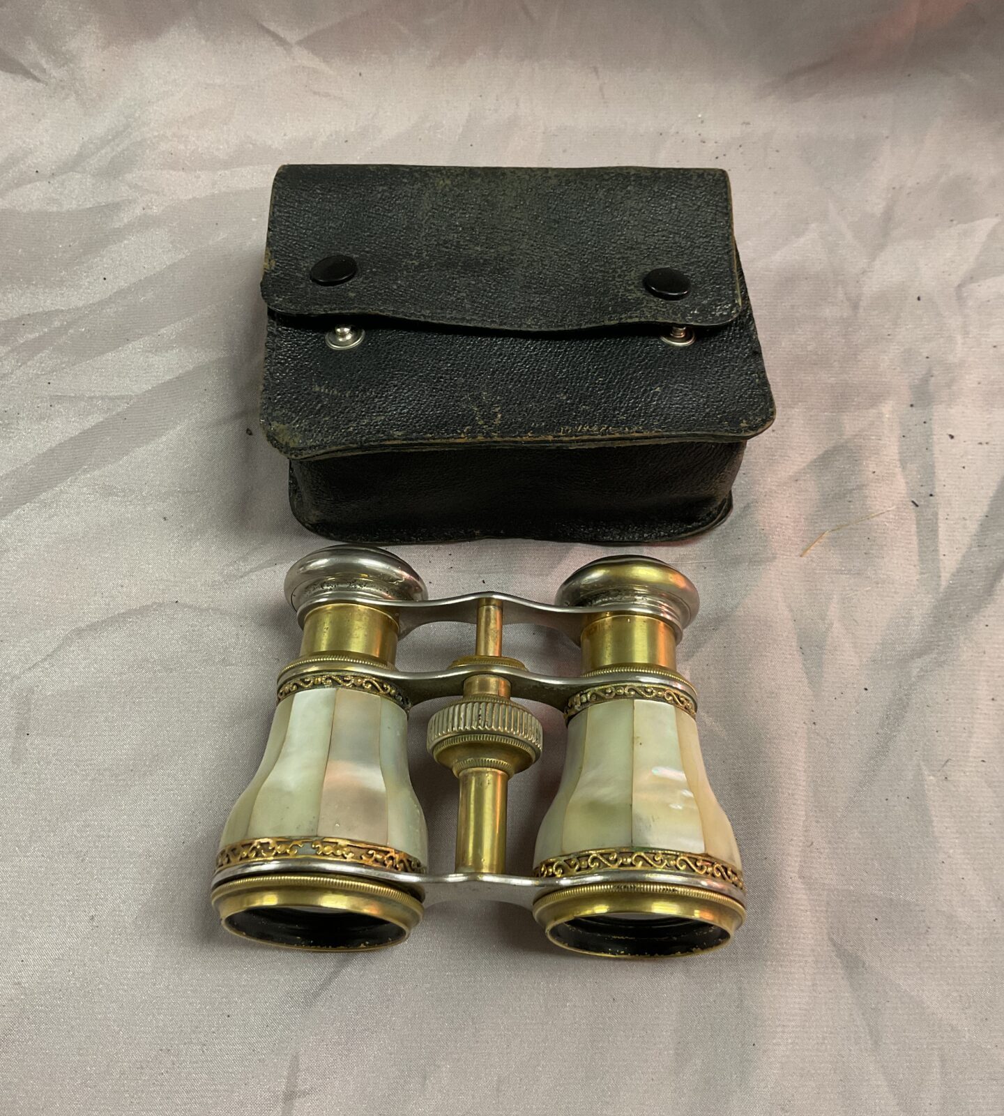 Pair of antique mother of pearl opera glasses with case