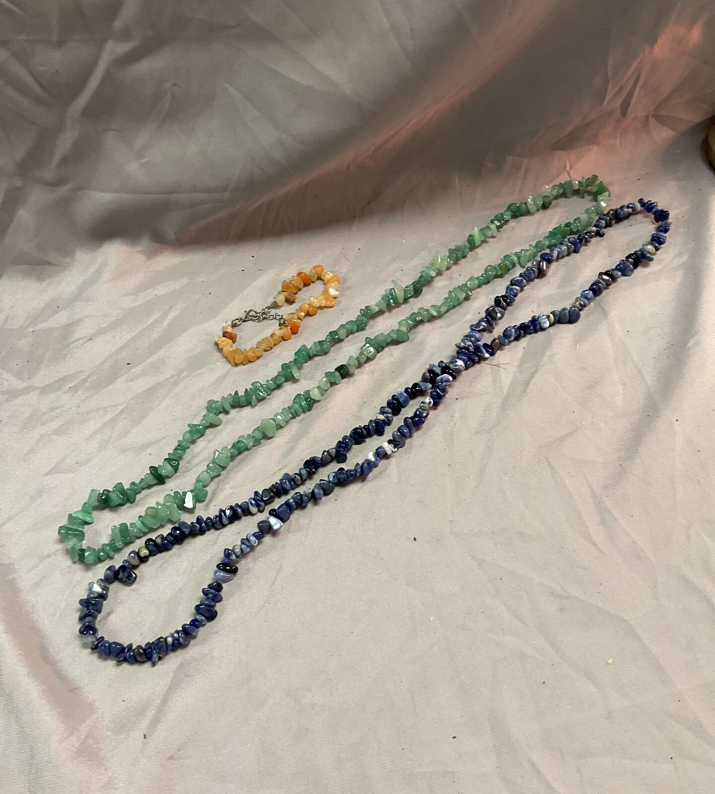 Two 30” stone necklaces and a bracelet