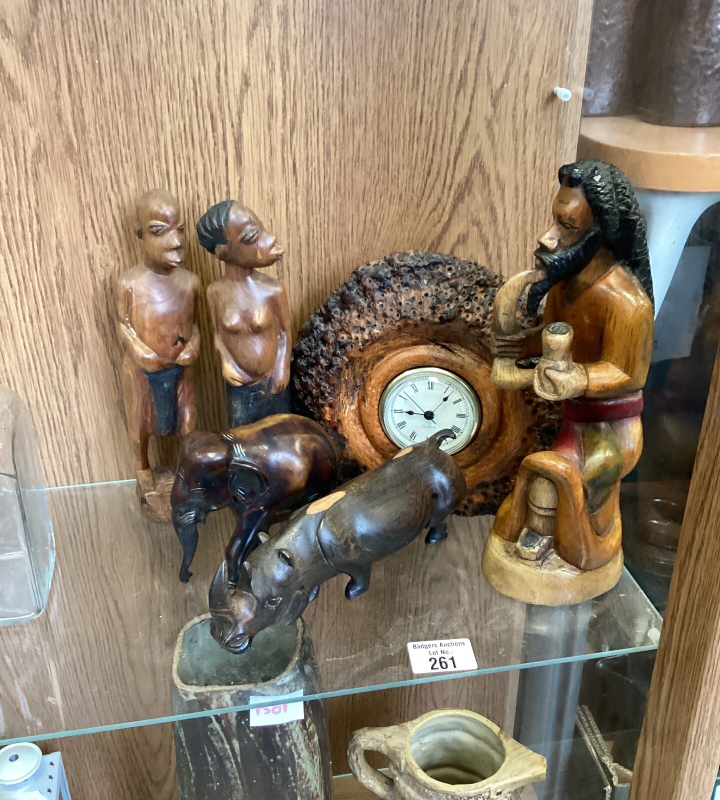 Selection of Handcrafted African Sculptures with clock