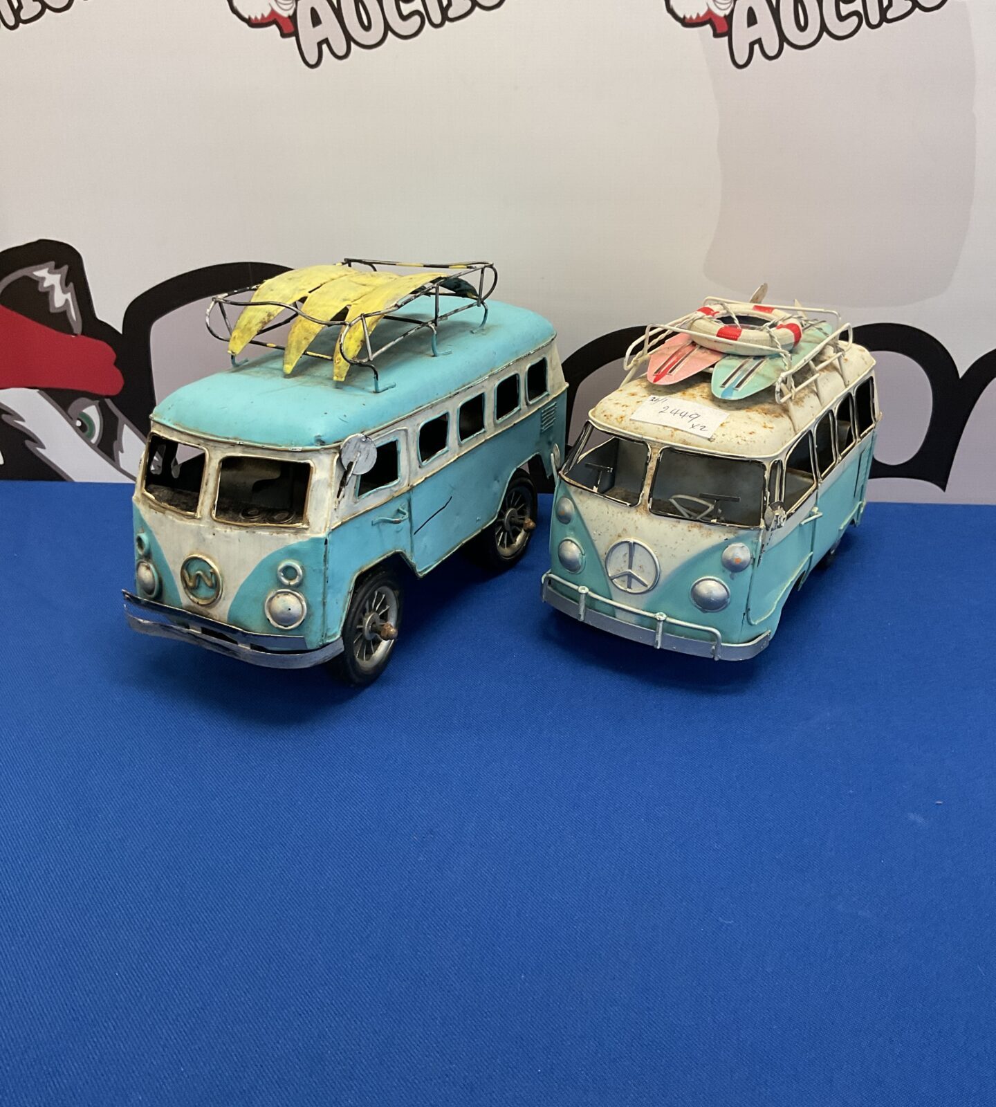 Two vintage tin model vw camper vans