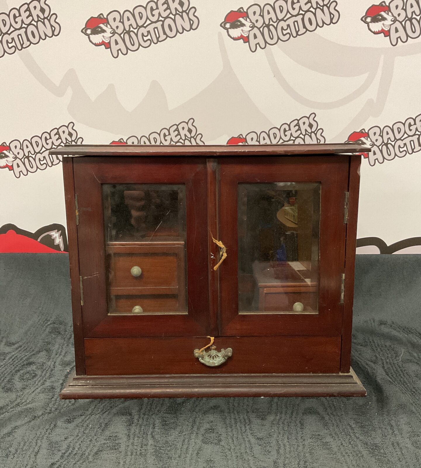 Vintage mahogany apothecary cabinet with key