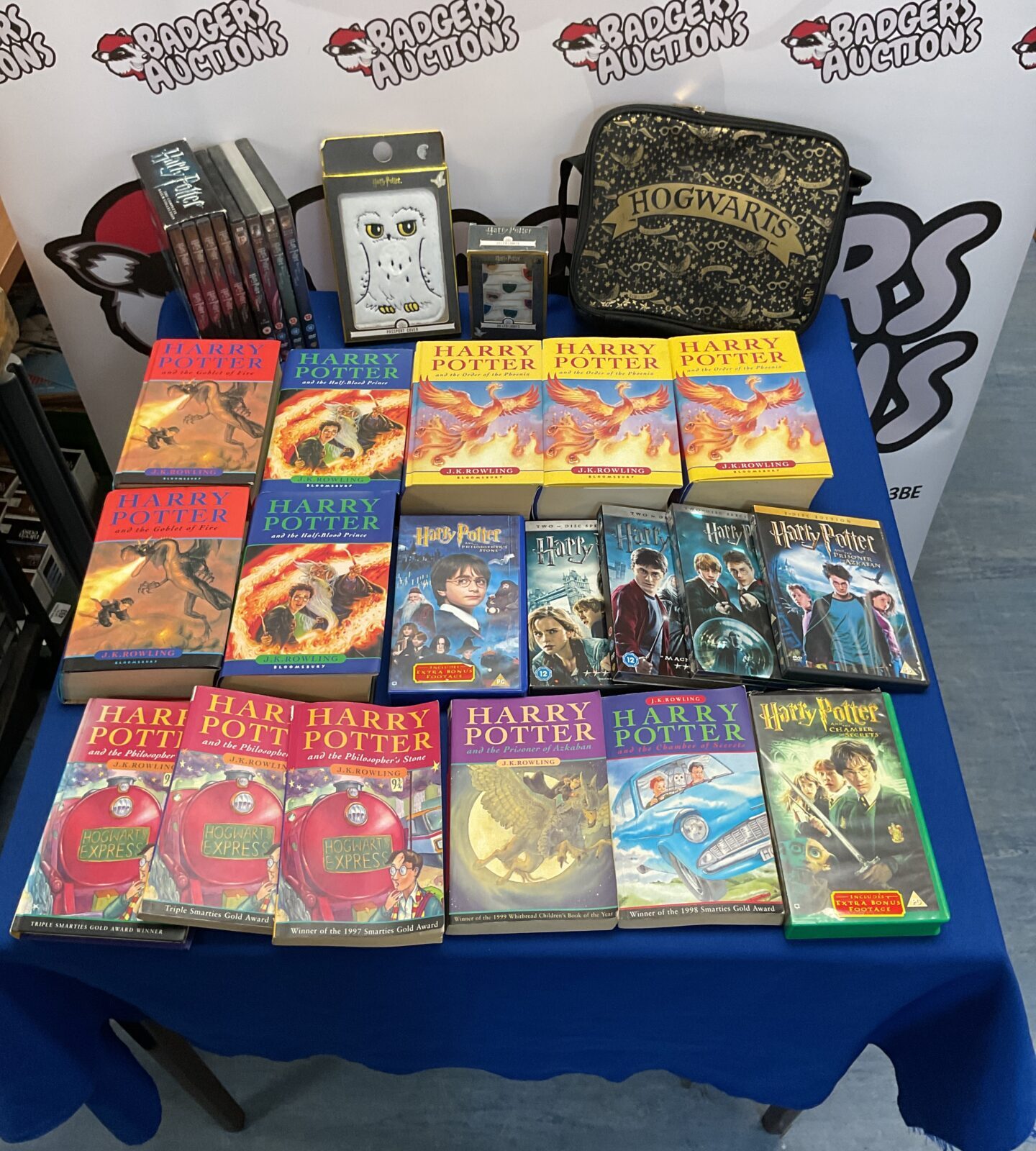 Bag of harry potter items containing collection of books and dvds inc selection of first editions