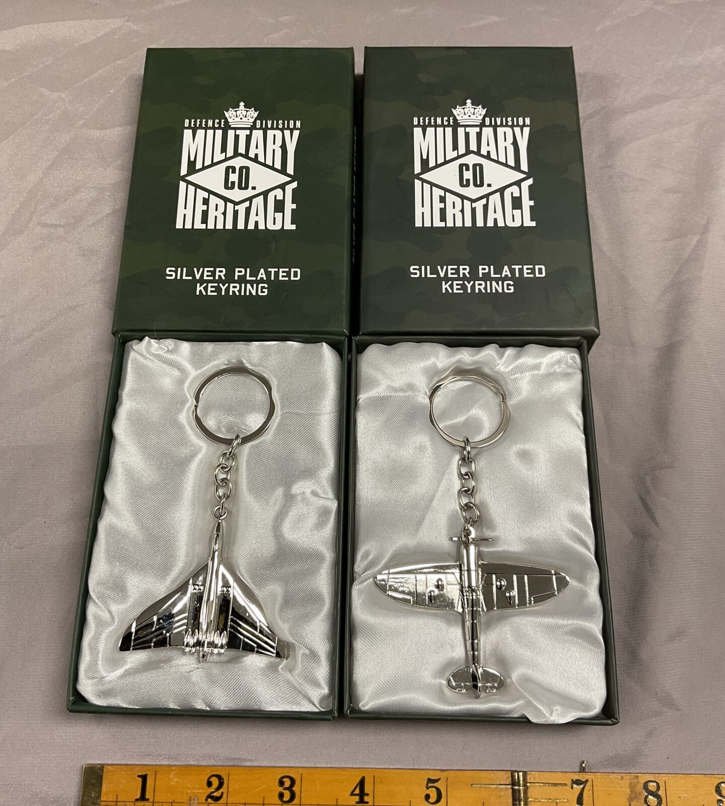 Two silver plated military heritage aircraft Keyrings spitfire and Vulcan bomber