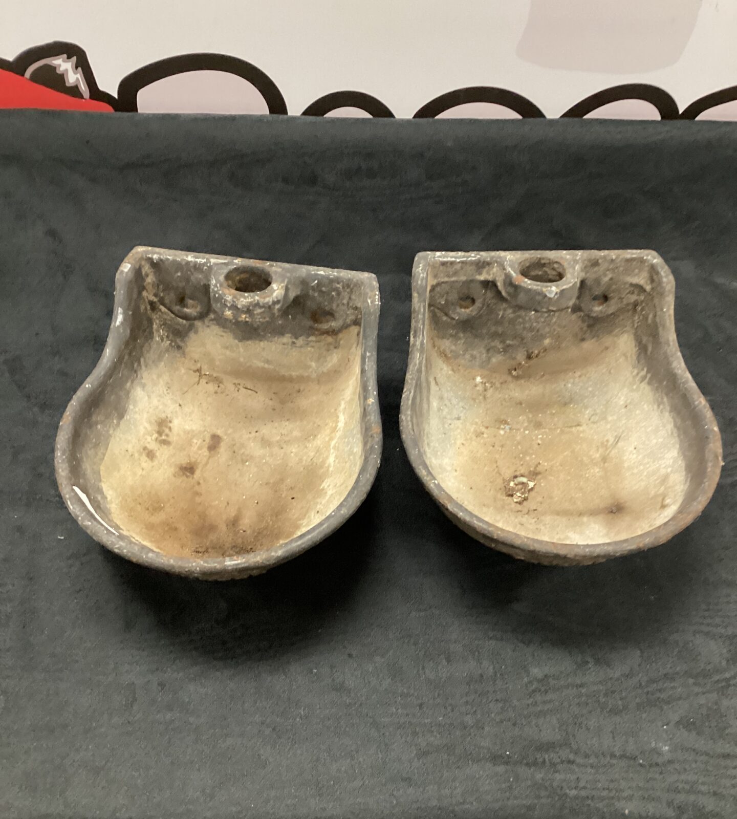 Two cattle drinking bowls