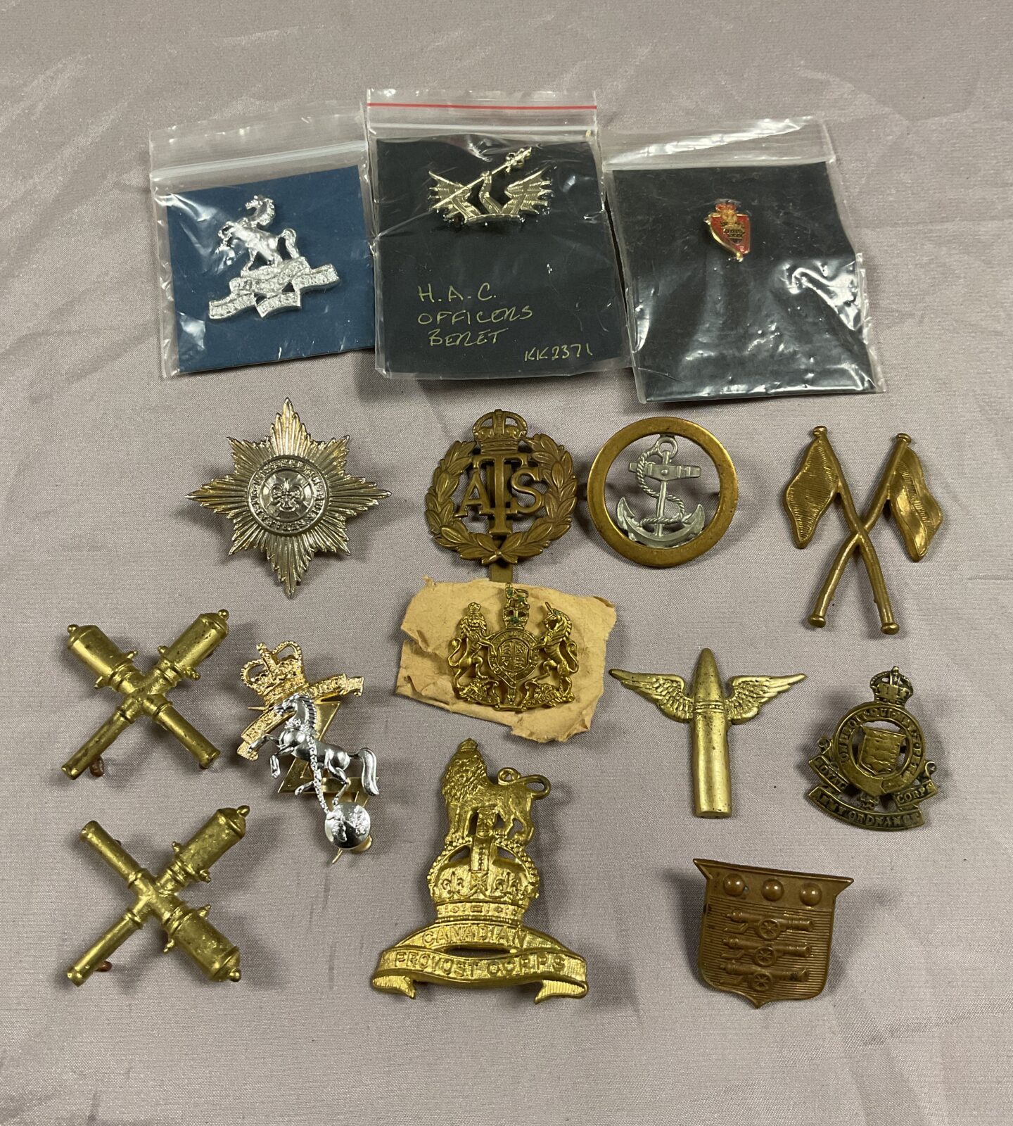 Collection of British military cap and collar  badges ww2 to date