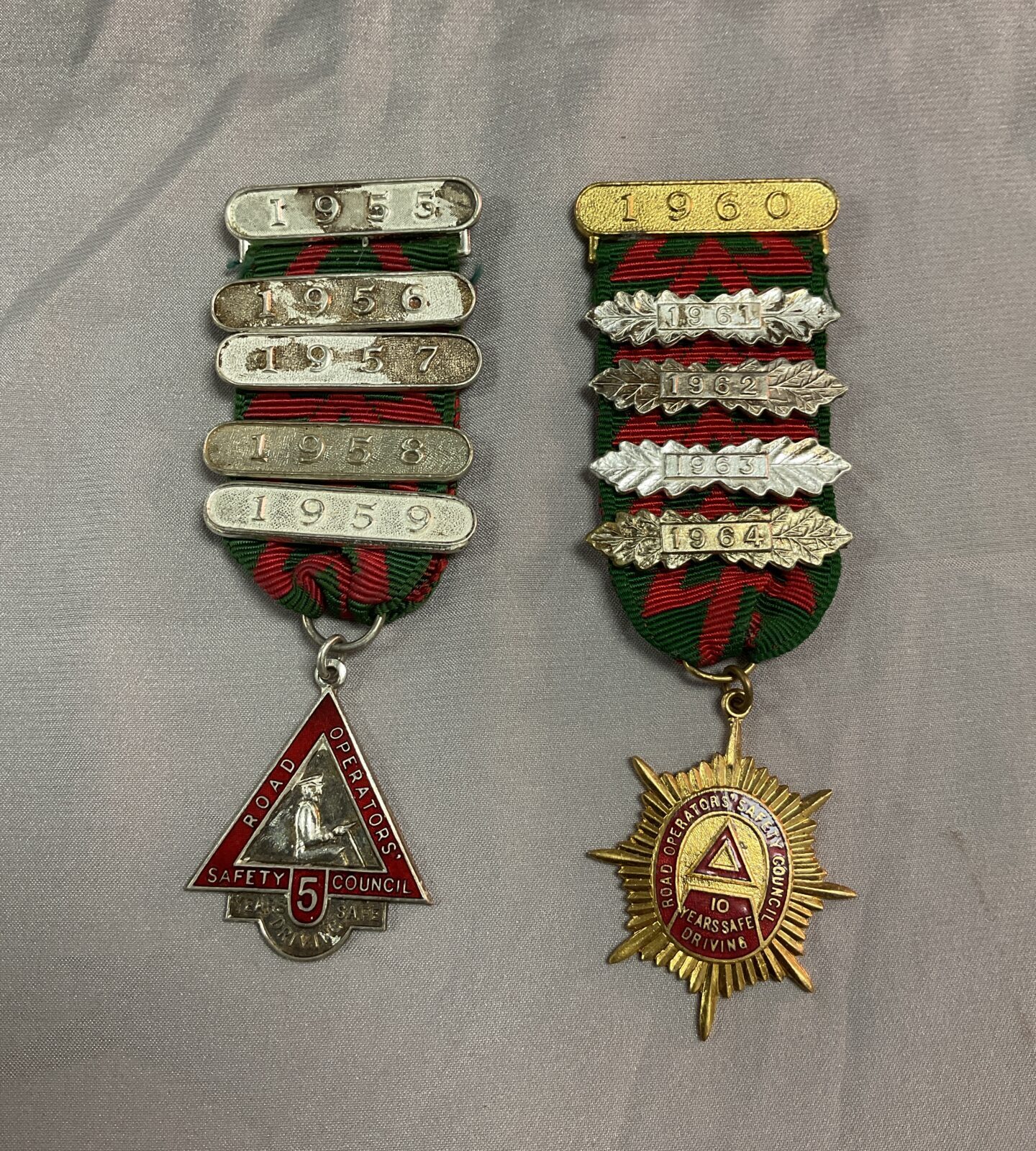 pair of road operators safety council driving medals 1955 / 64