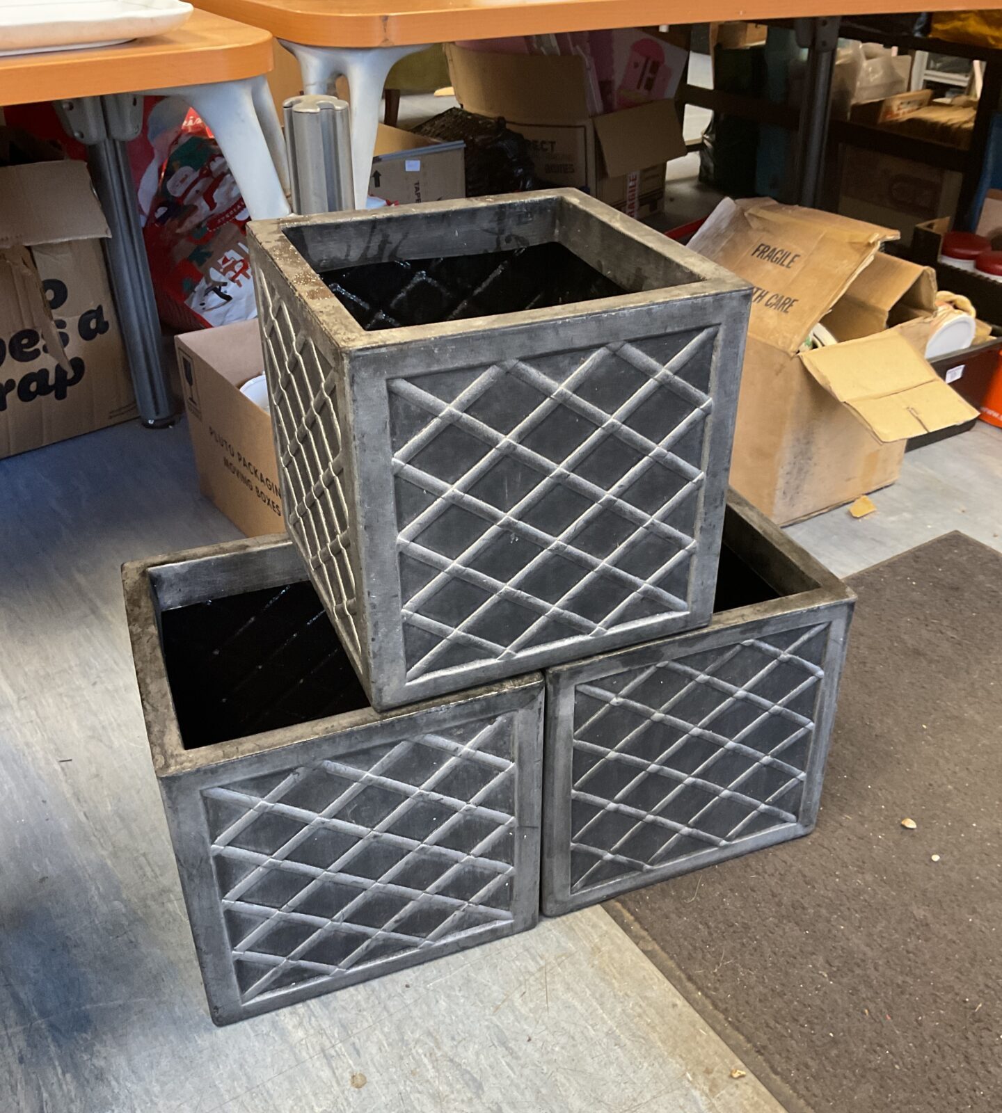 Three plastic cube planters