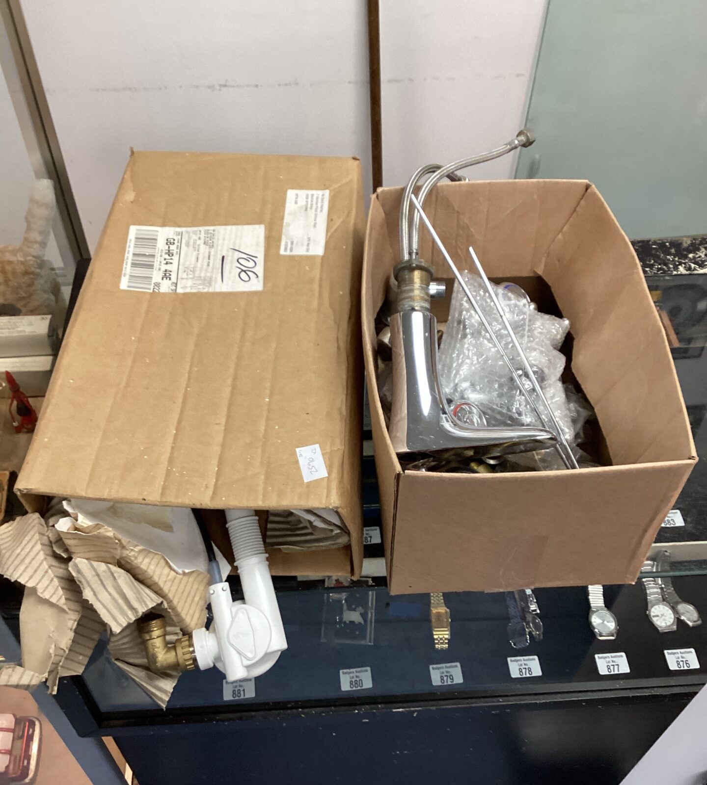 Box of  taps with fittings