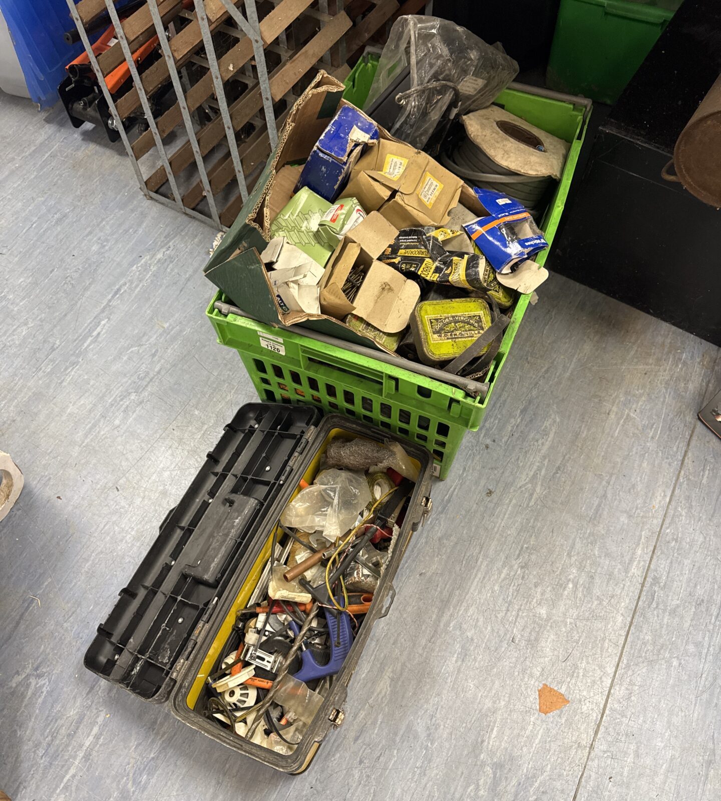 Large box of shed clearance items with a small toolbox