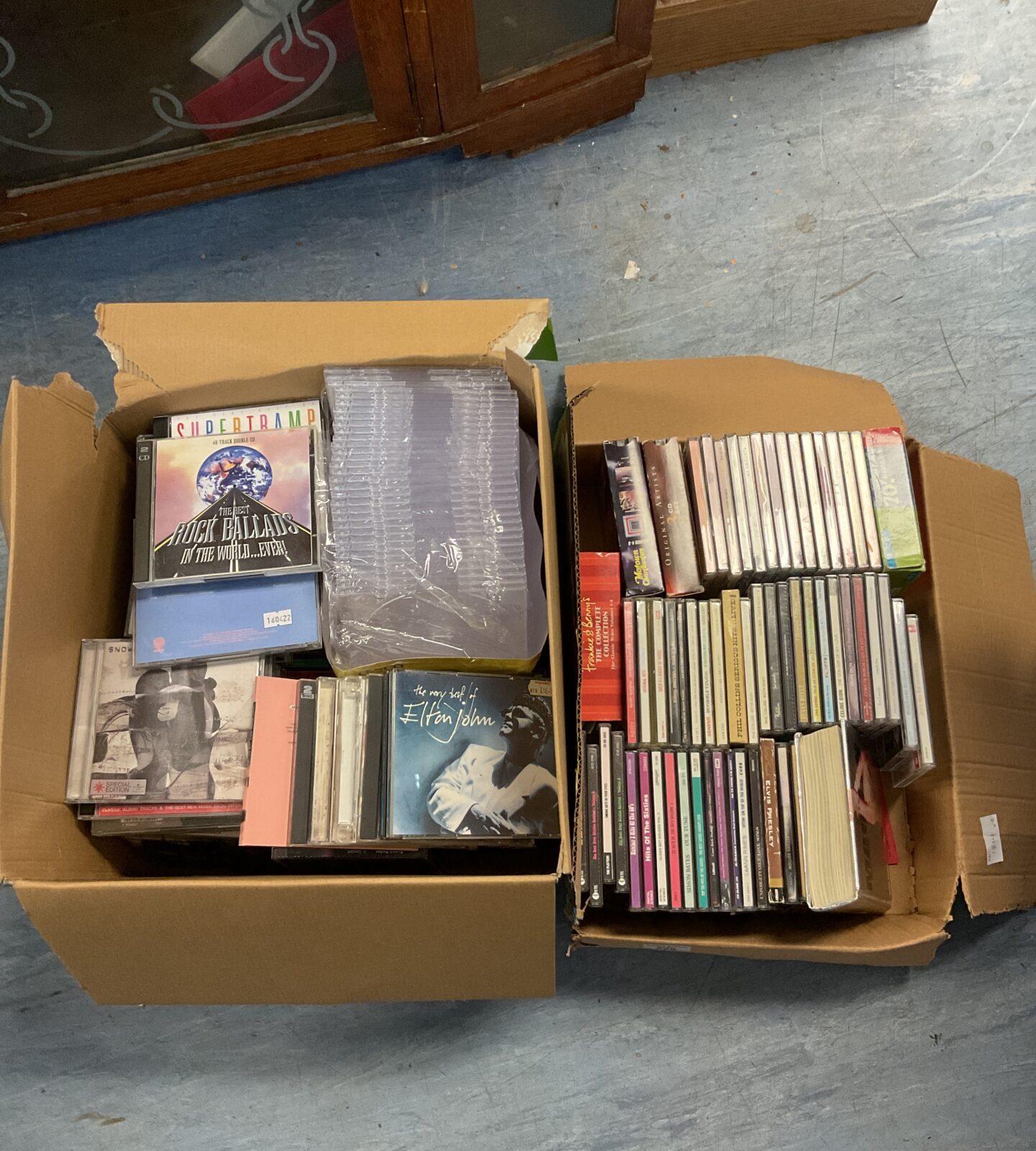 Two boxes of music cds inc elvis & elton john