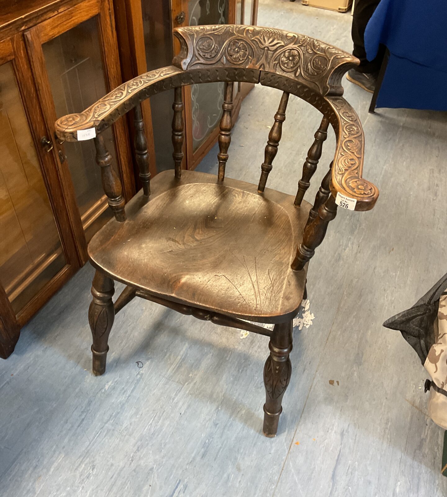 Antique hand carved captains chair with english rose design