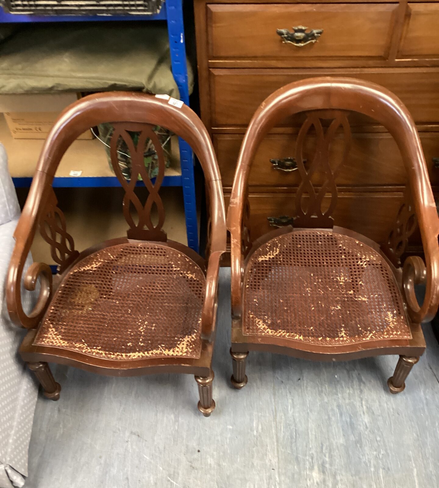 pair of rattan seated chairs