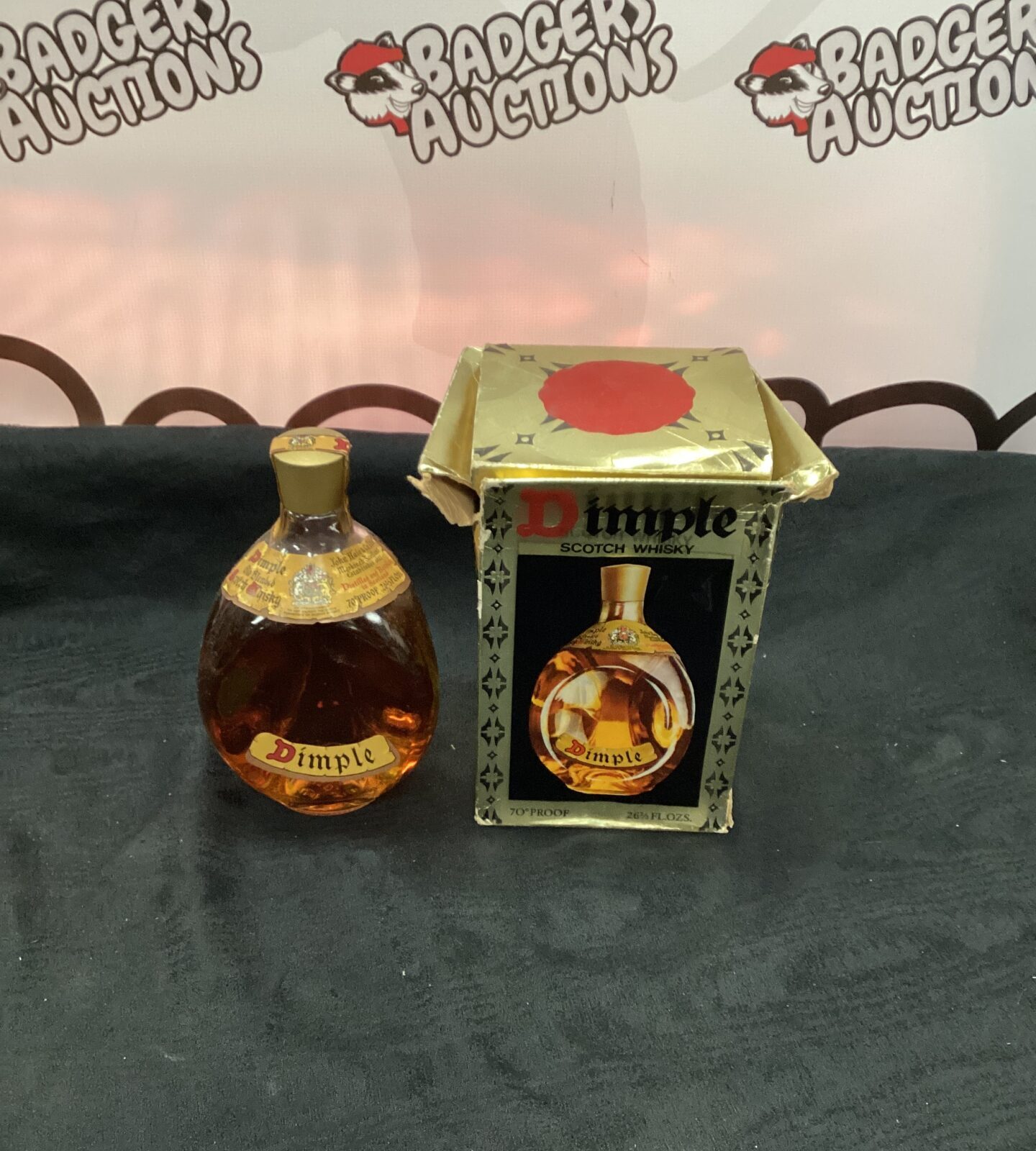 Bottle of Dimple 70% proof Scotch Whisky