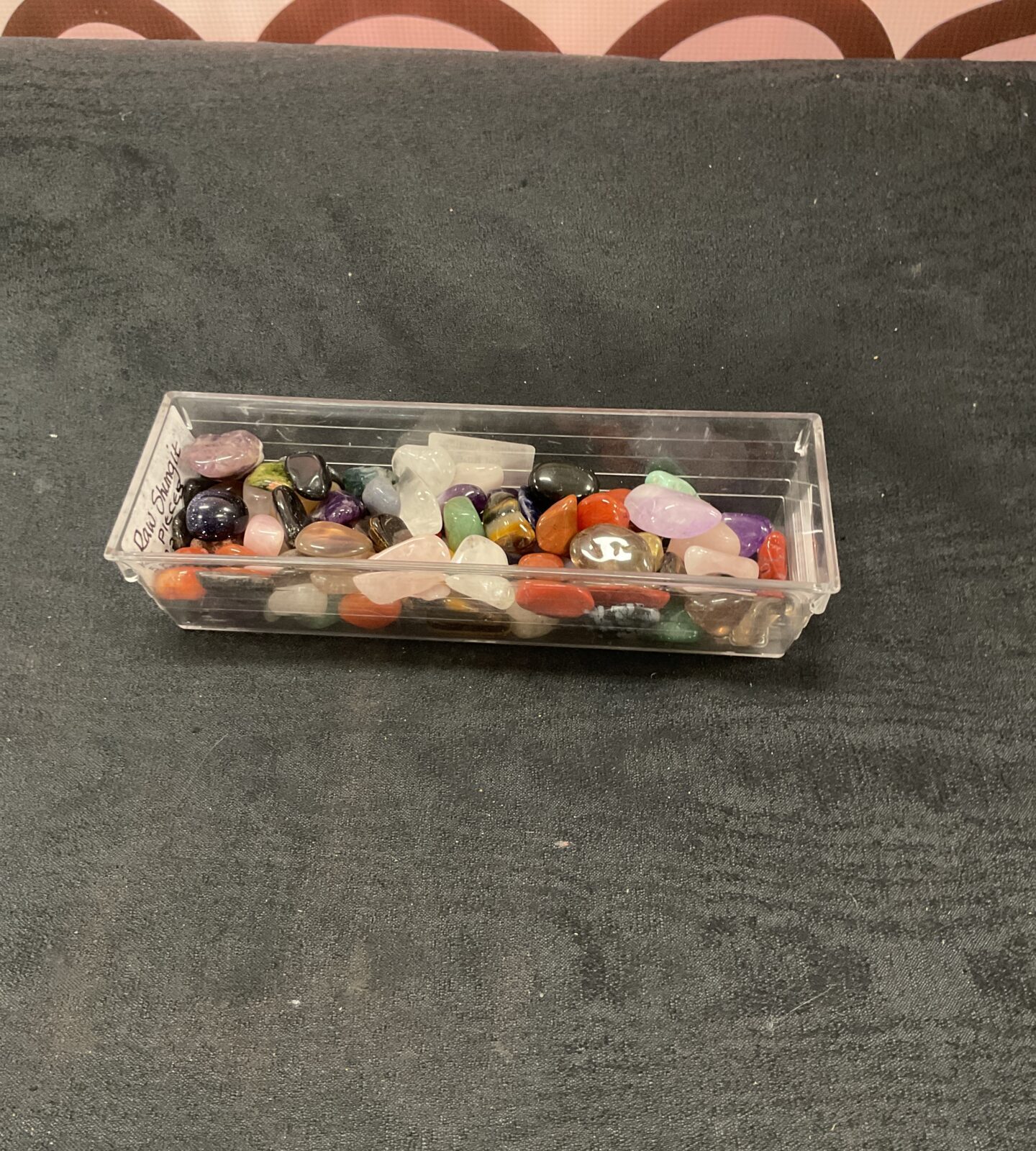 Tub of polished tumble stones