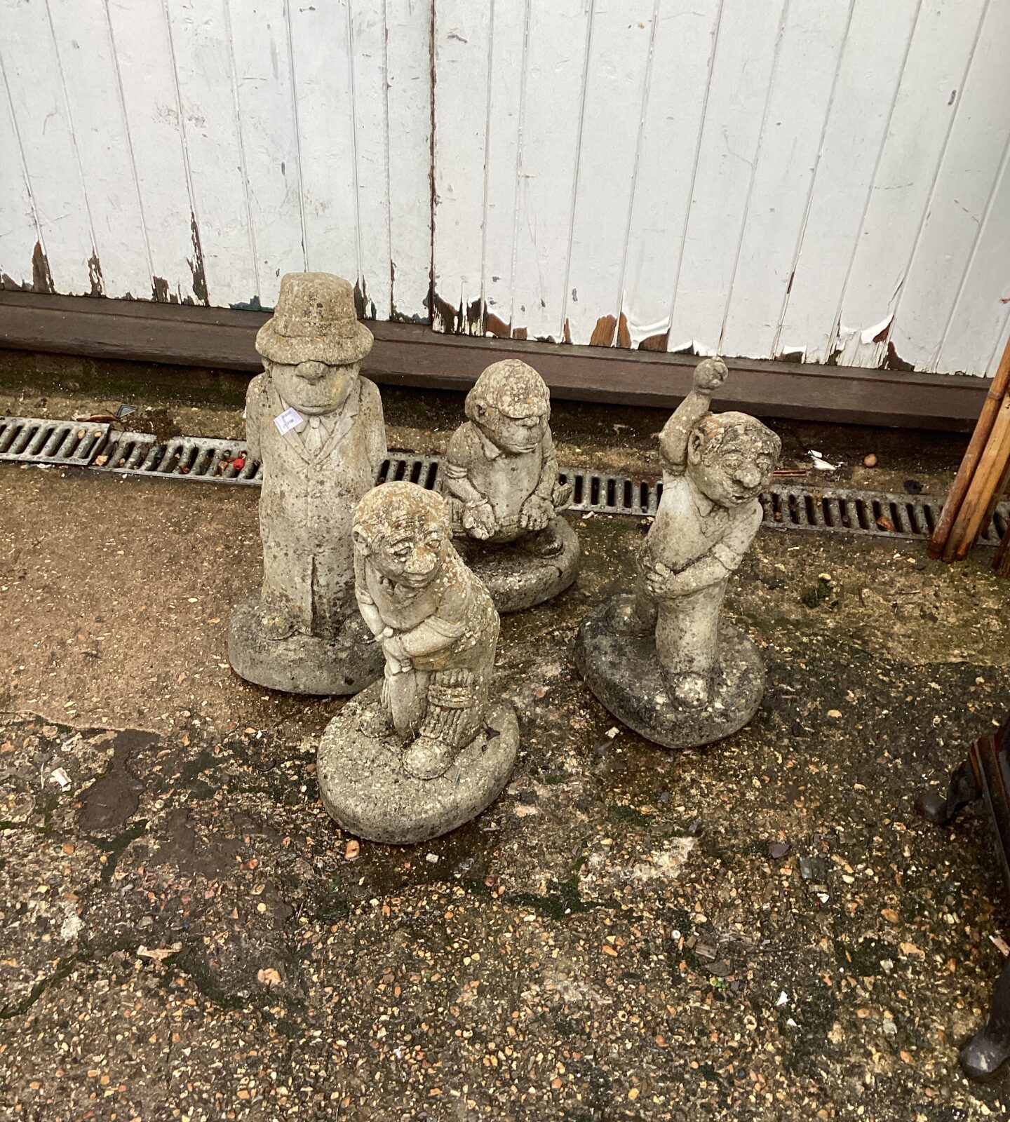 Set of cricket related garden ornaments