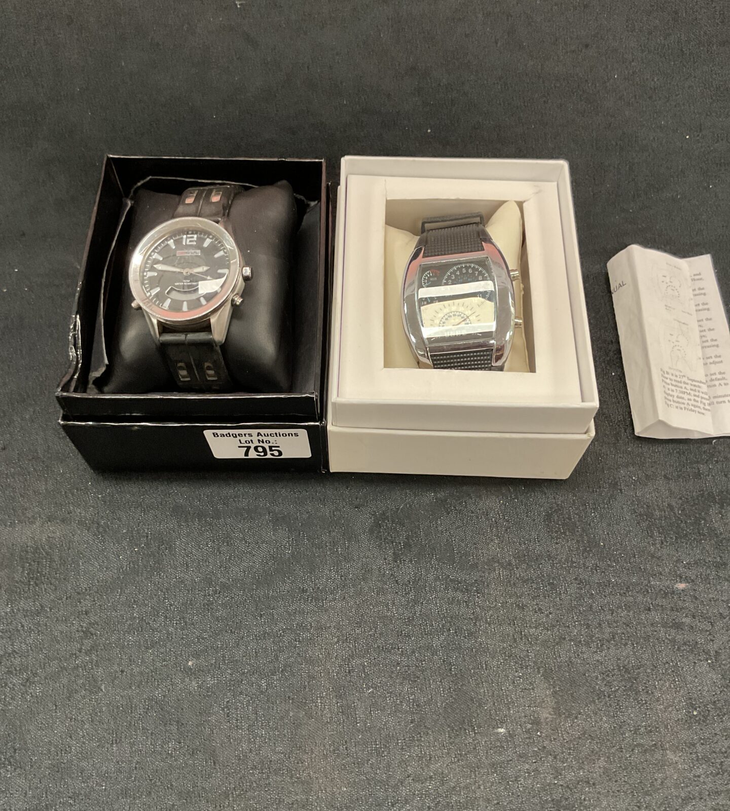 Two mens wristwatches in boxes inc gul and digital