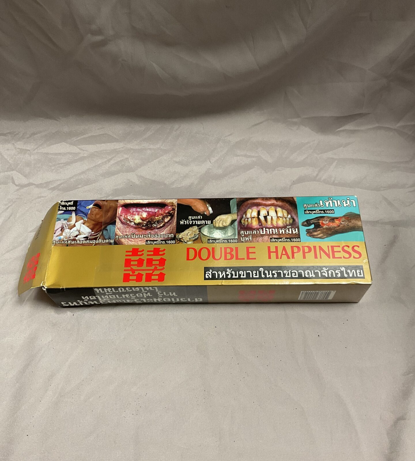 box of 9 packs double happiness cigarettes