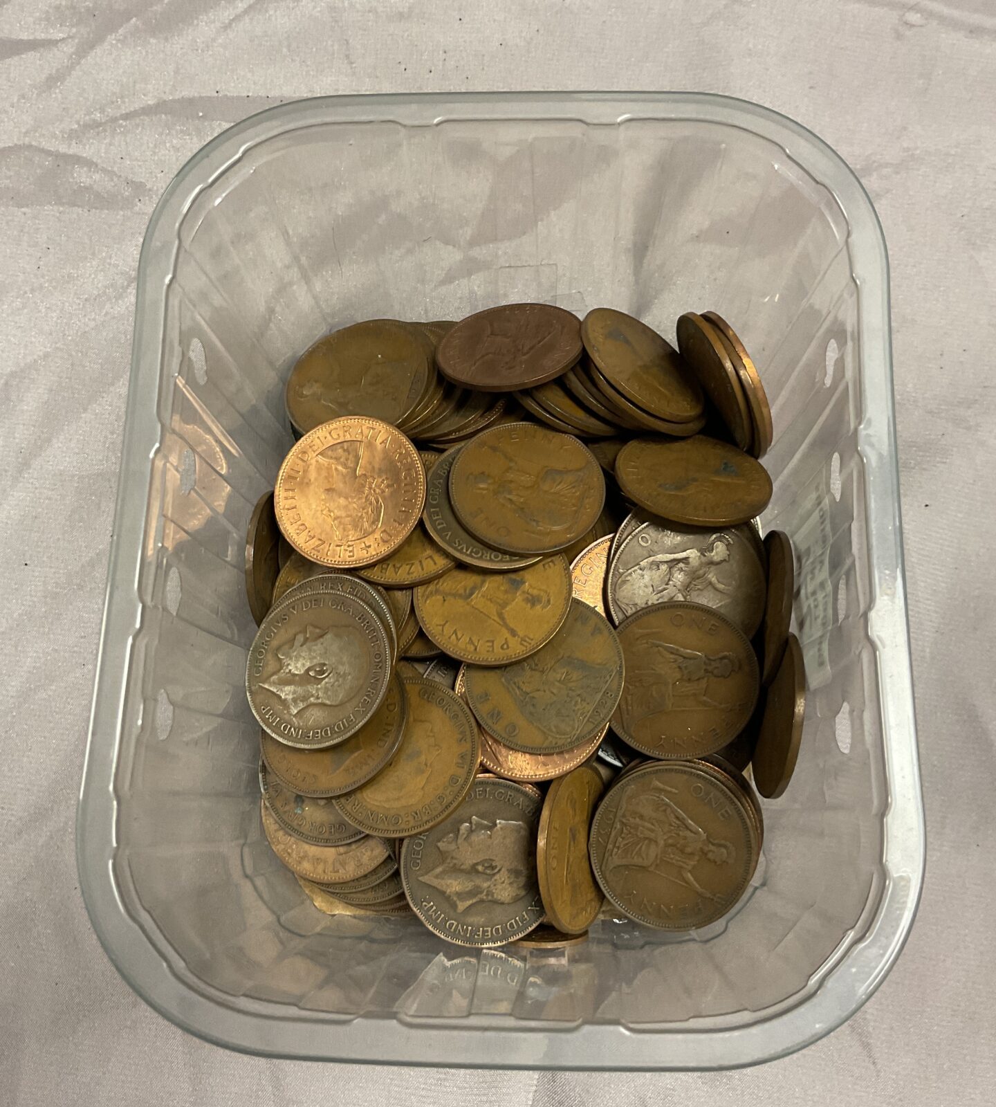 Tub of assorted pennies