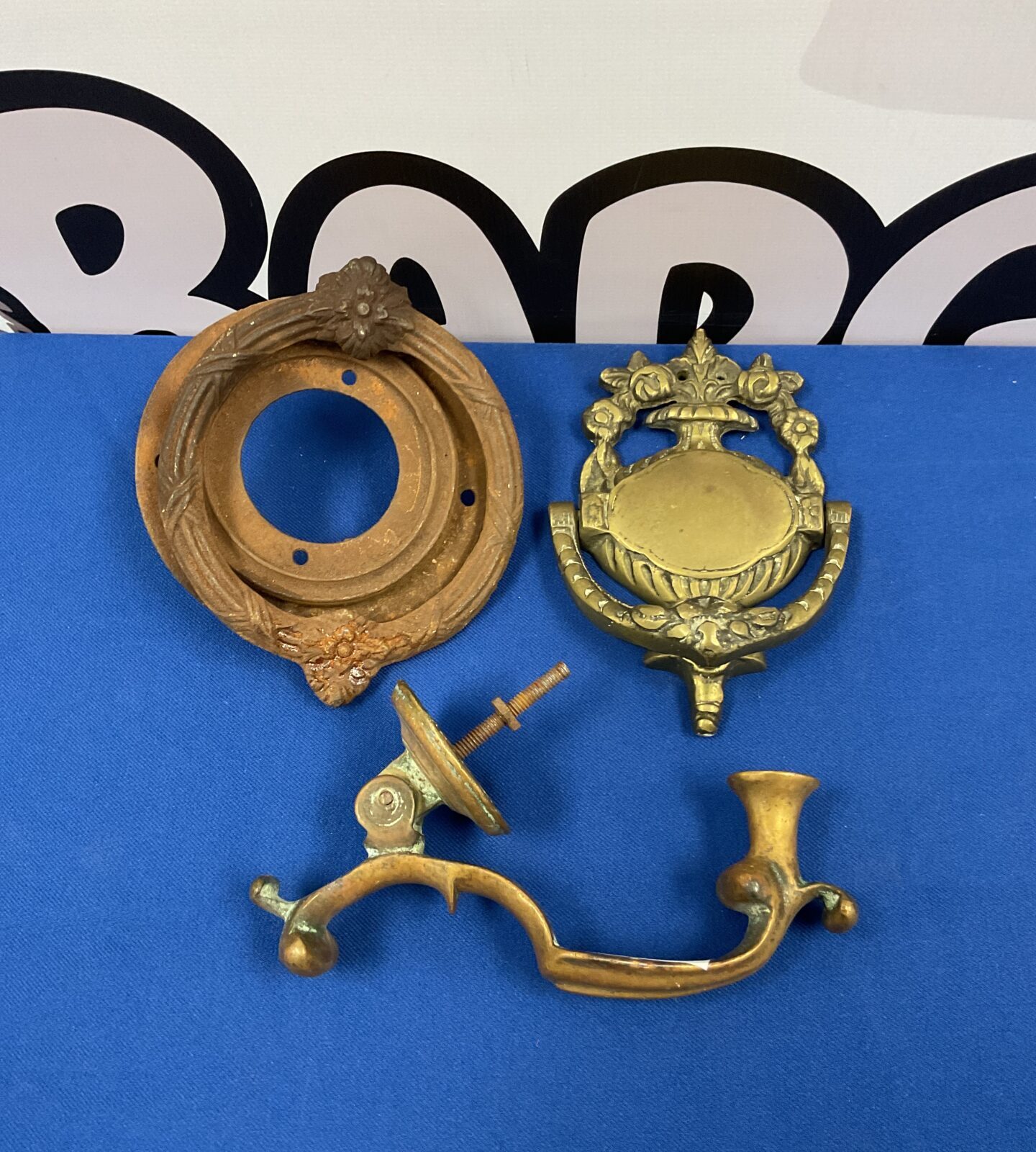 Three victorian brass door knockers