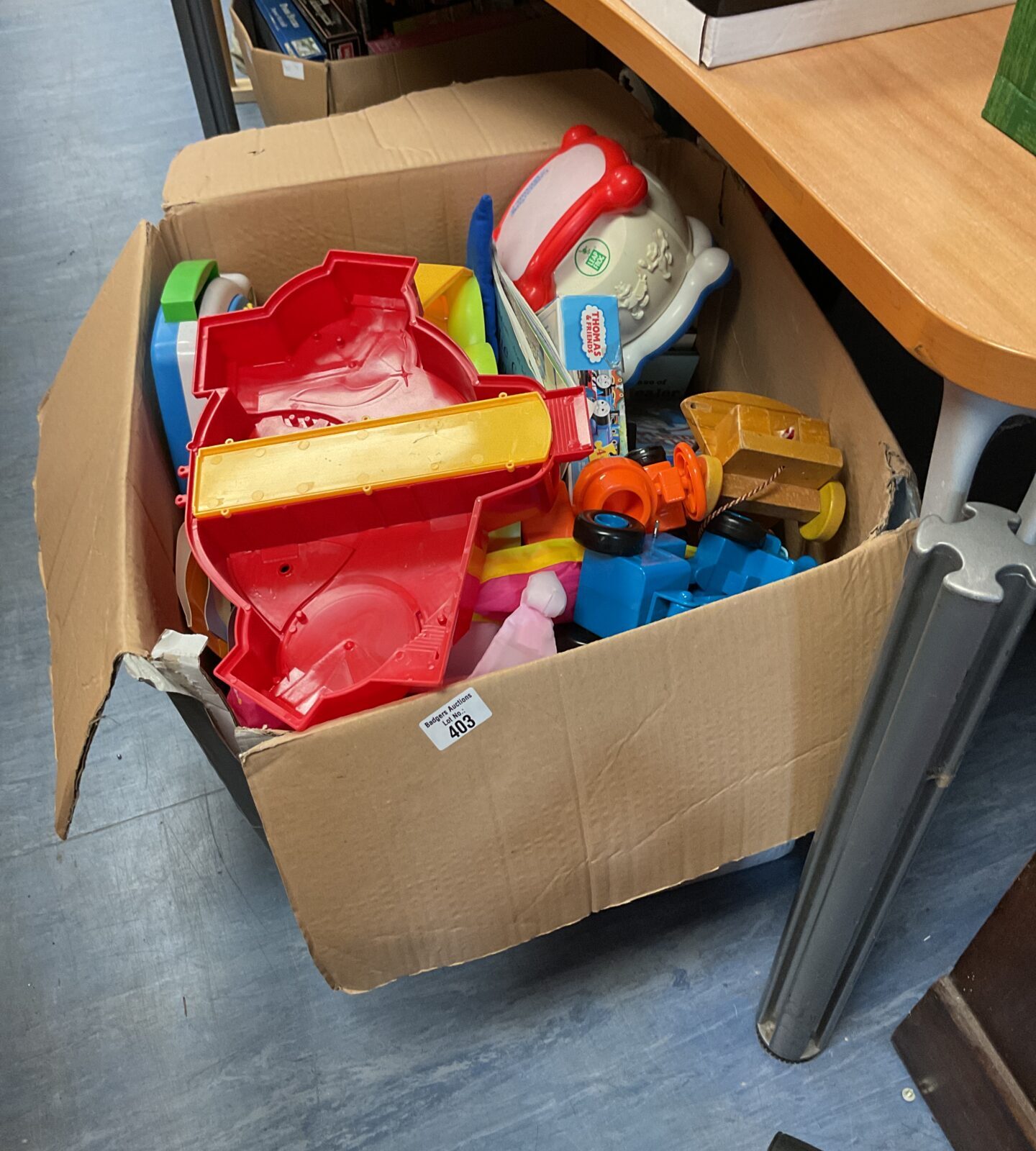 Large box of mixed toys