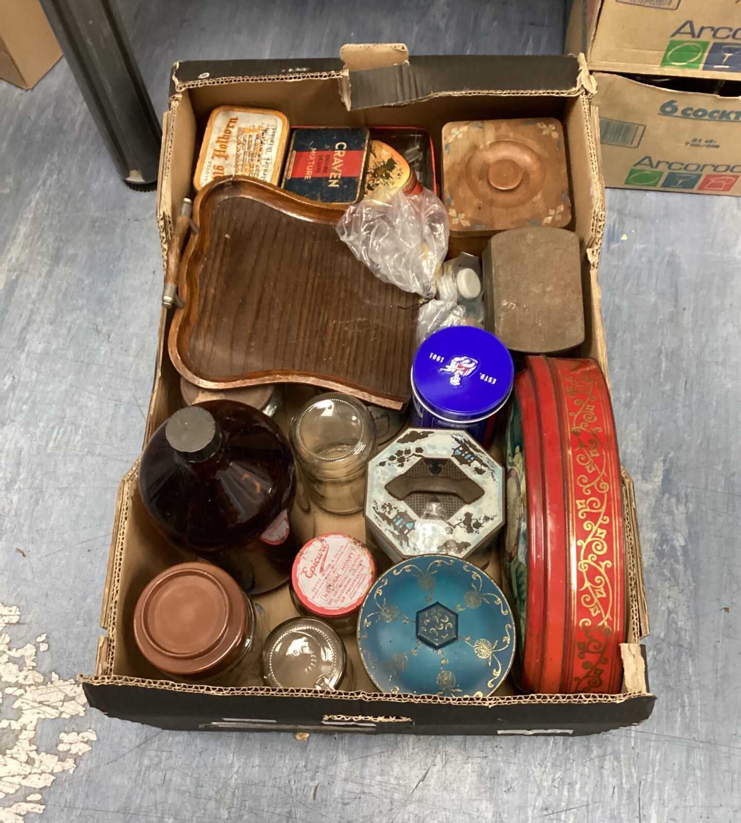 Box of vintage collectable Tins and bottles