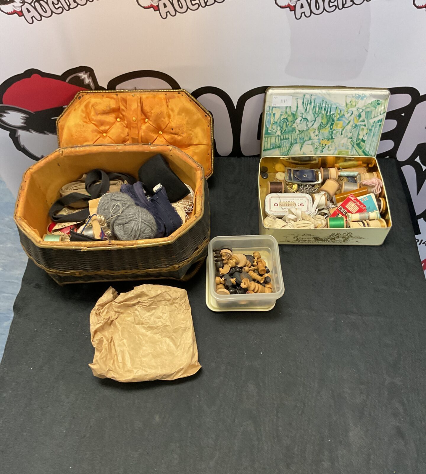 Vintage sewing basket and a tin of sewing accessories