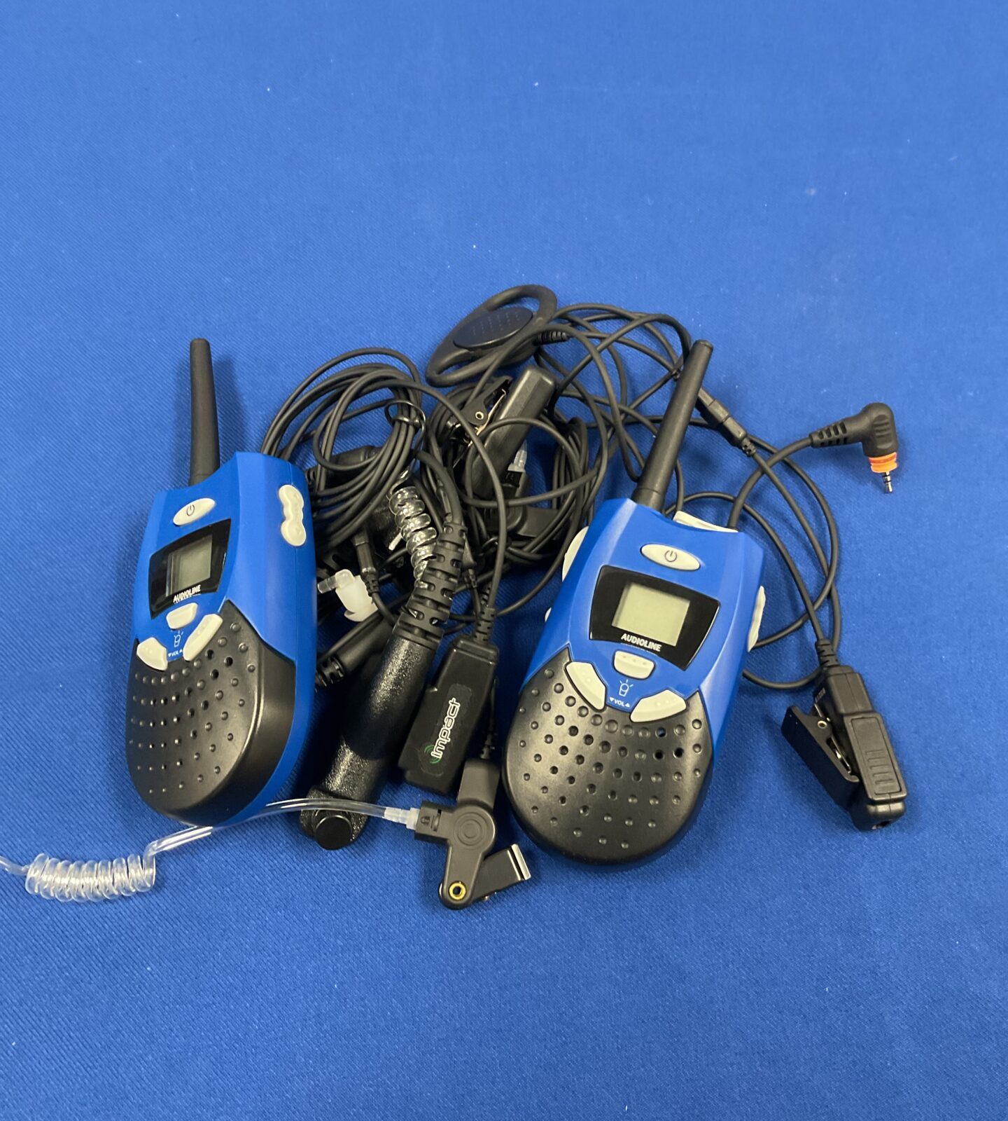 Pair of audioline walkie talkies with headsets