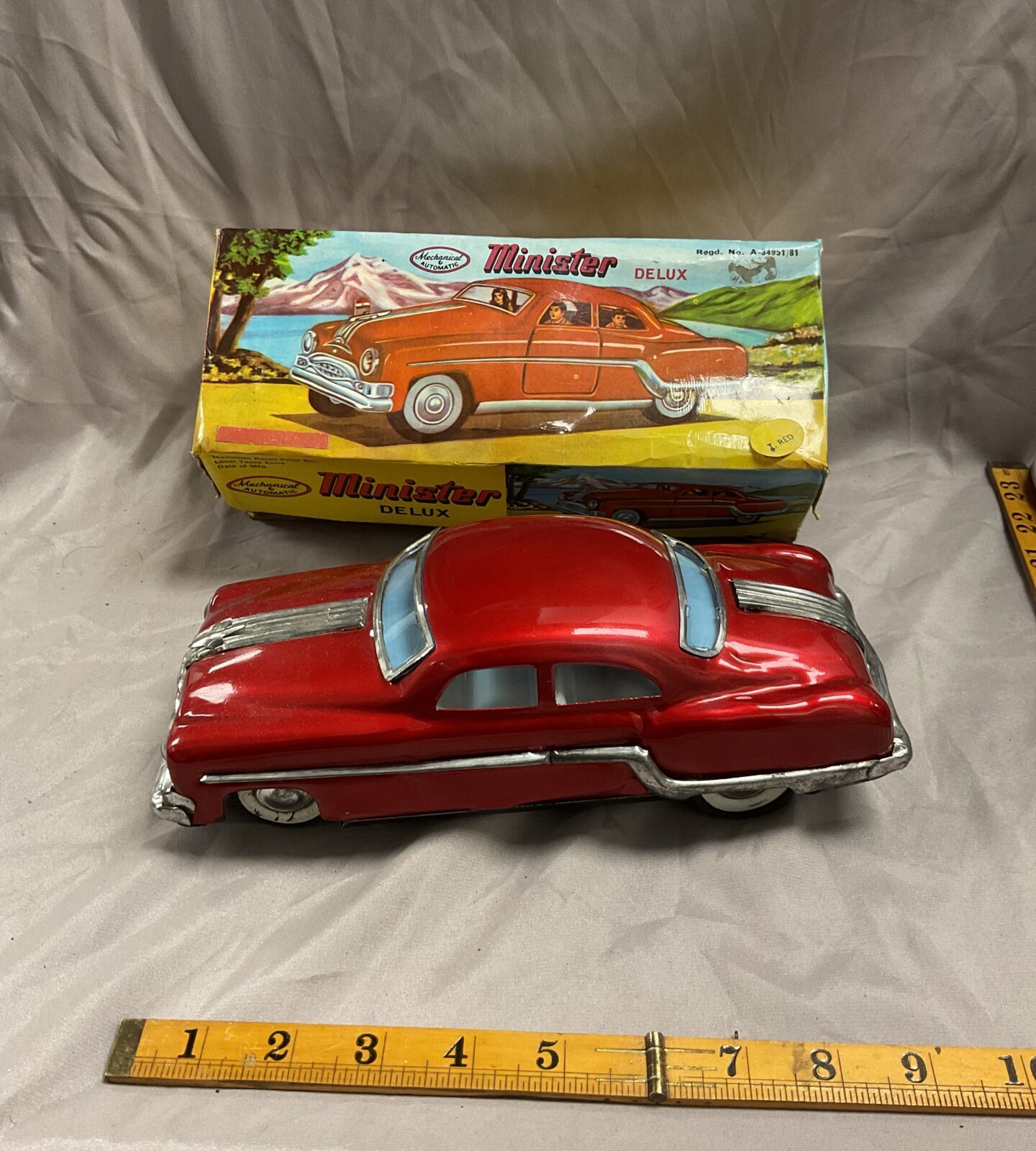 Vintage tinplate minister delux friction drive toy car in original box