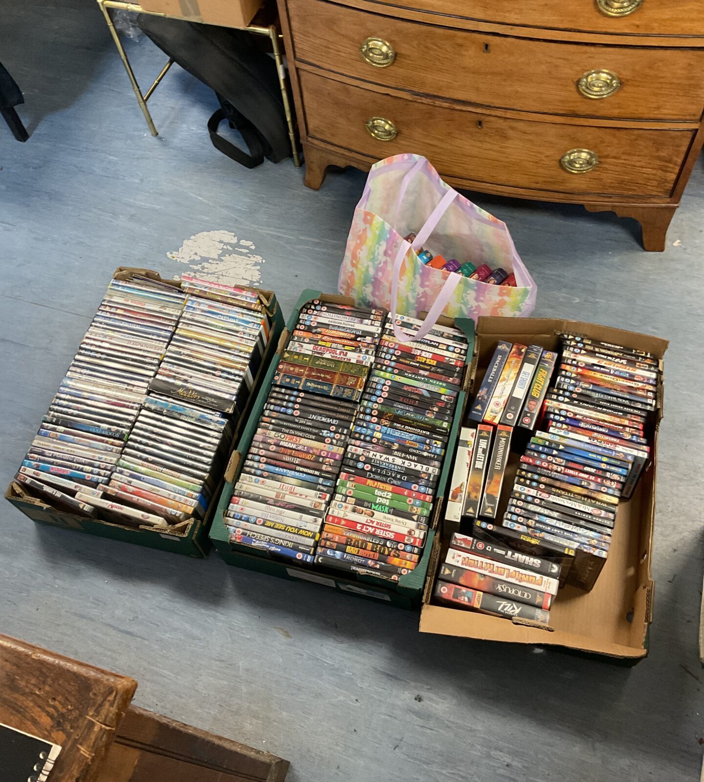 Three trays of dvds & vhs cassettes