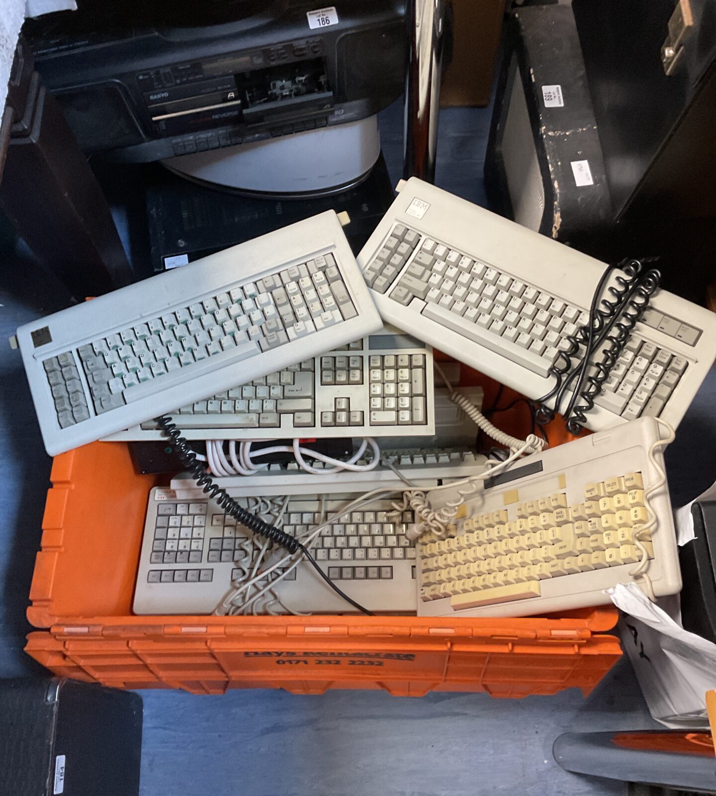 Box of vintage computer keyboards including ibm & aeg