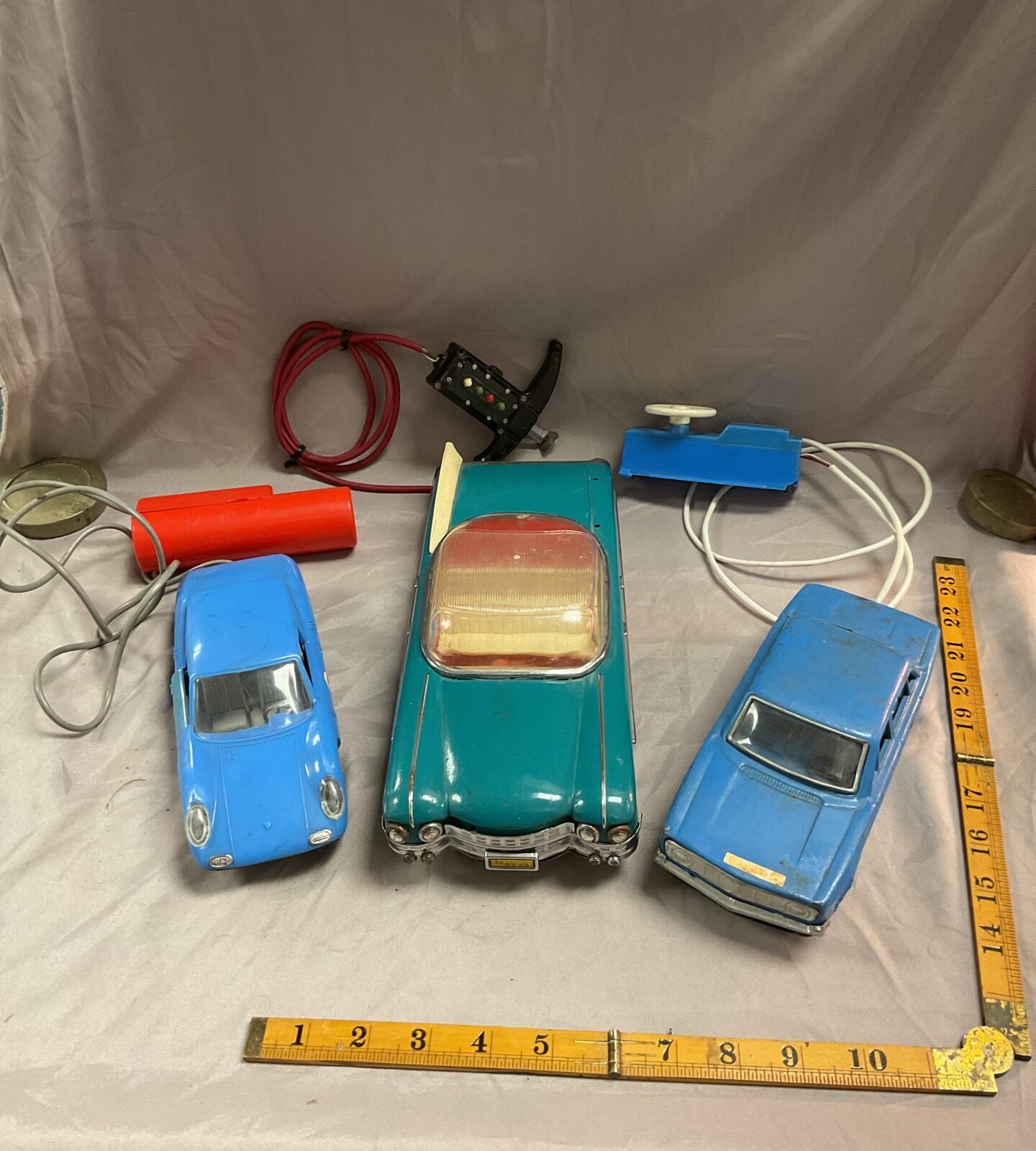 Three vintage remote control cars