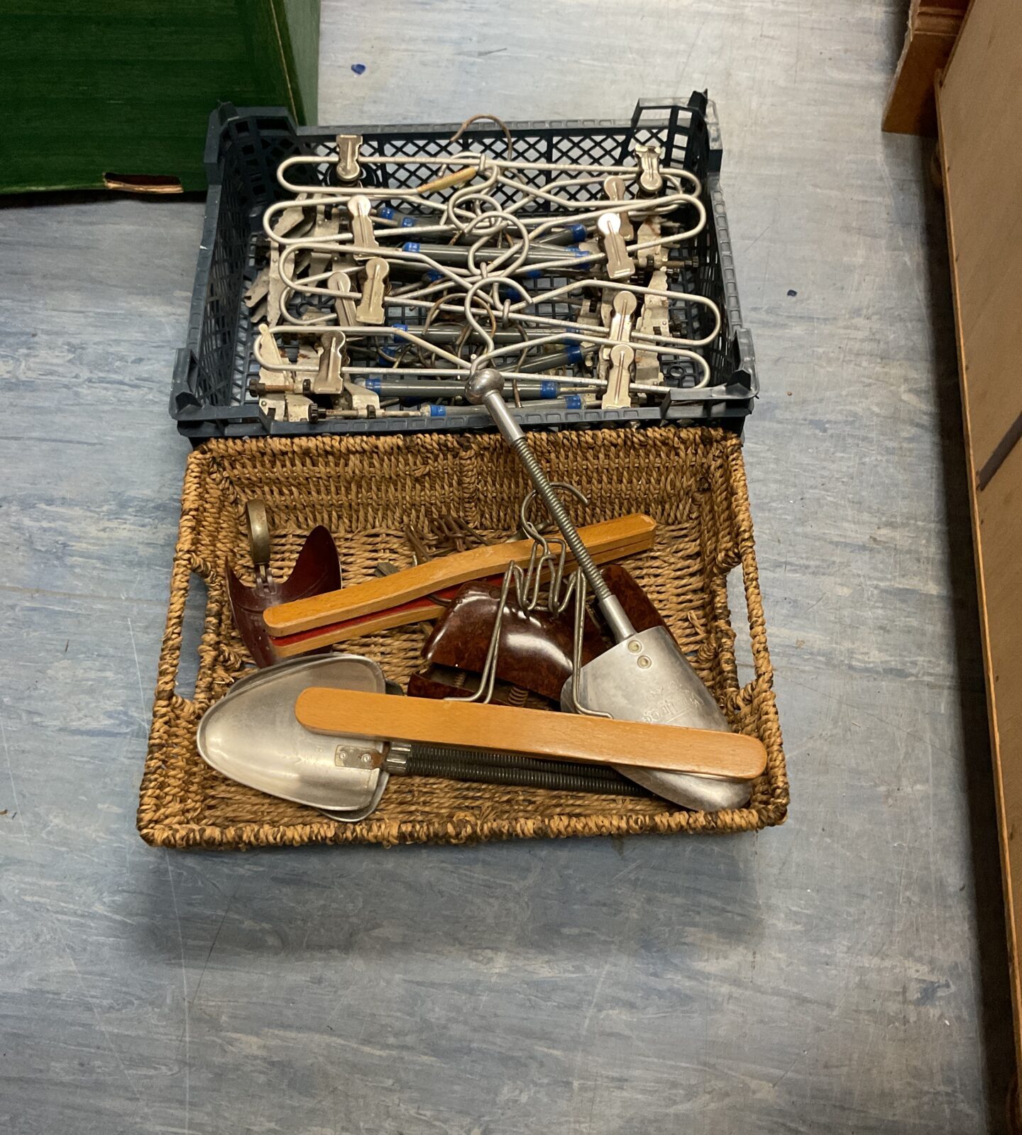 Crate of hangers and shoe stretchers