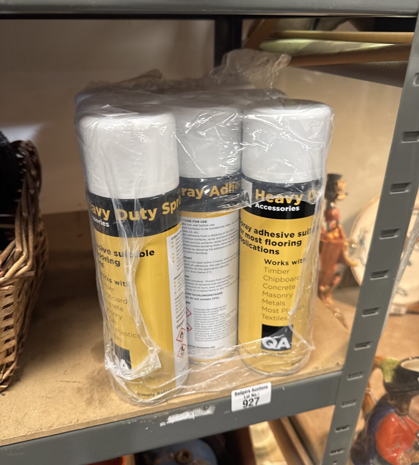 Nine cans of heavy duty flooring adhesive spray