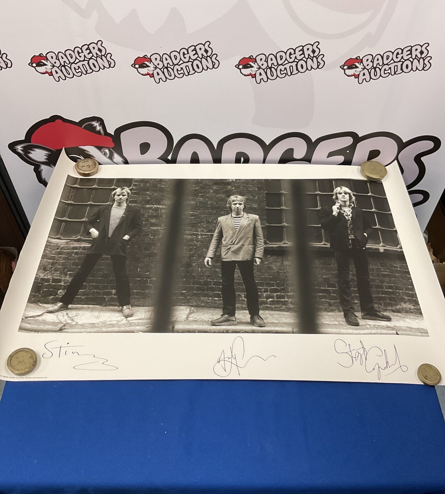 The police signed poster including sting