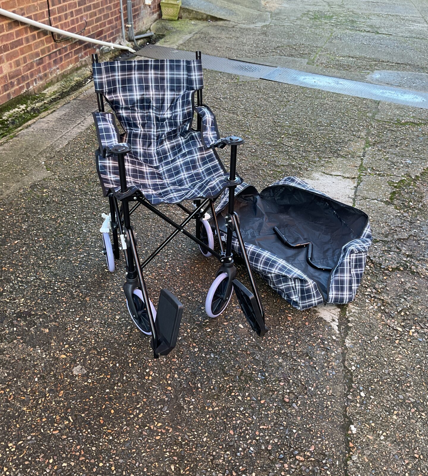 Cooper folding wheelchair with cover