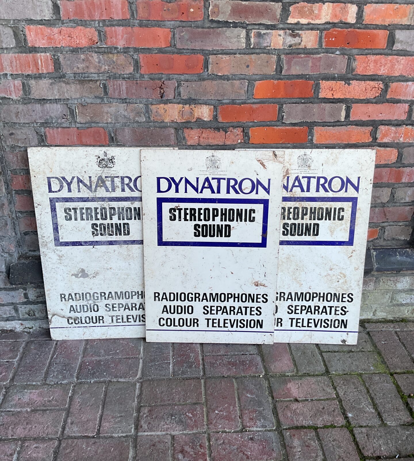 Three vintage wooden dynatron advertising boards