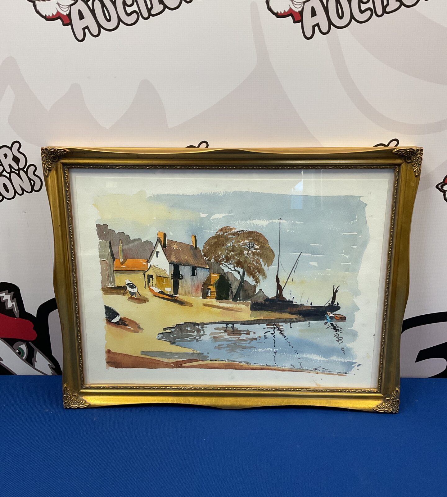 Gilt framed watercolour of fishing boats n dock