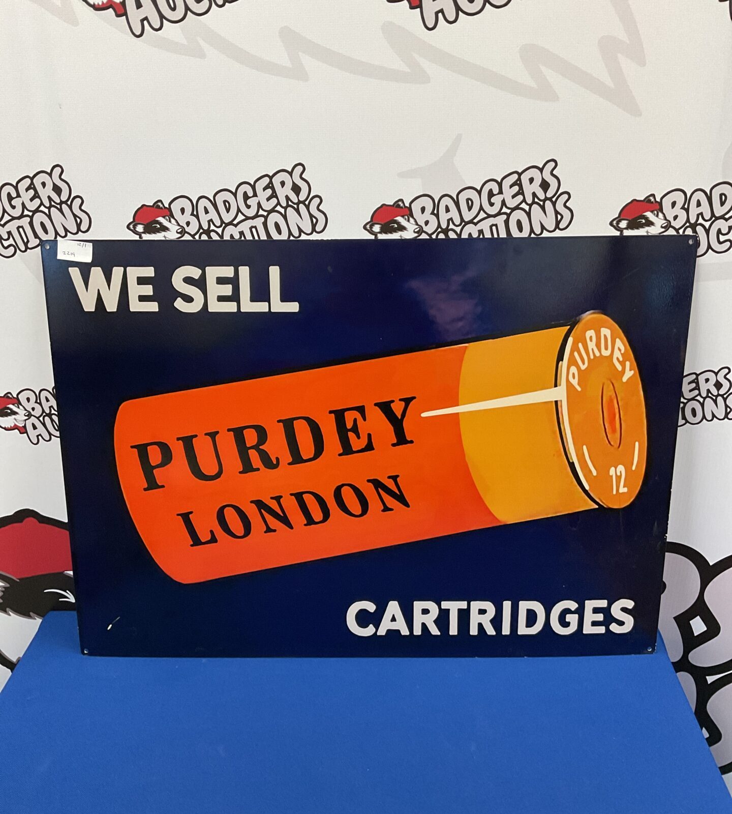 Tin purdey London shotgun cartridge sign