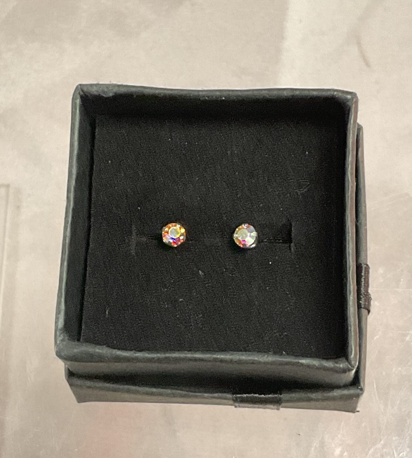 Pair of 9ct gold stud earrings with coloured stones