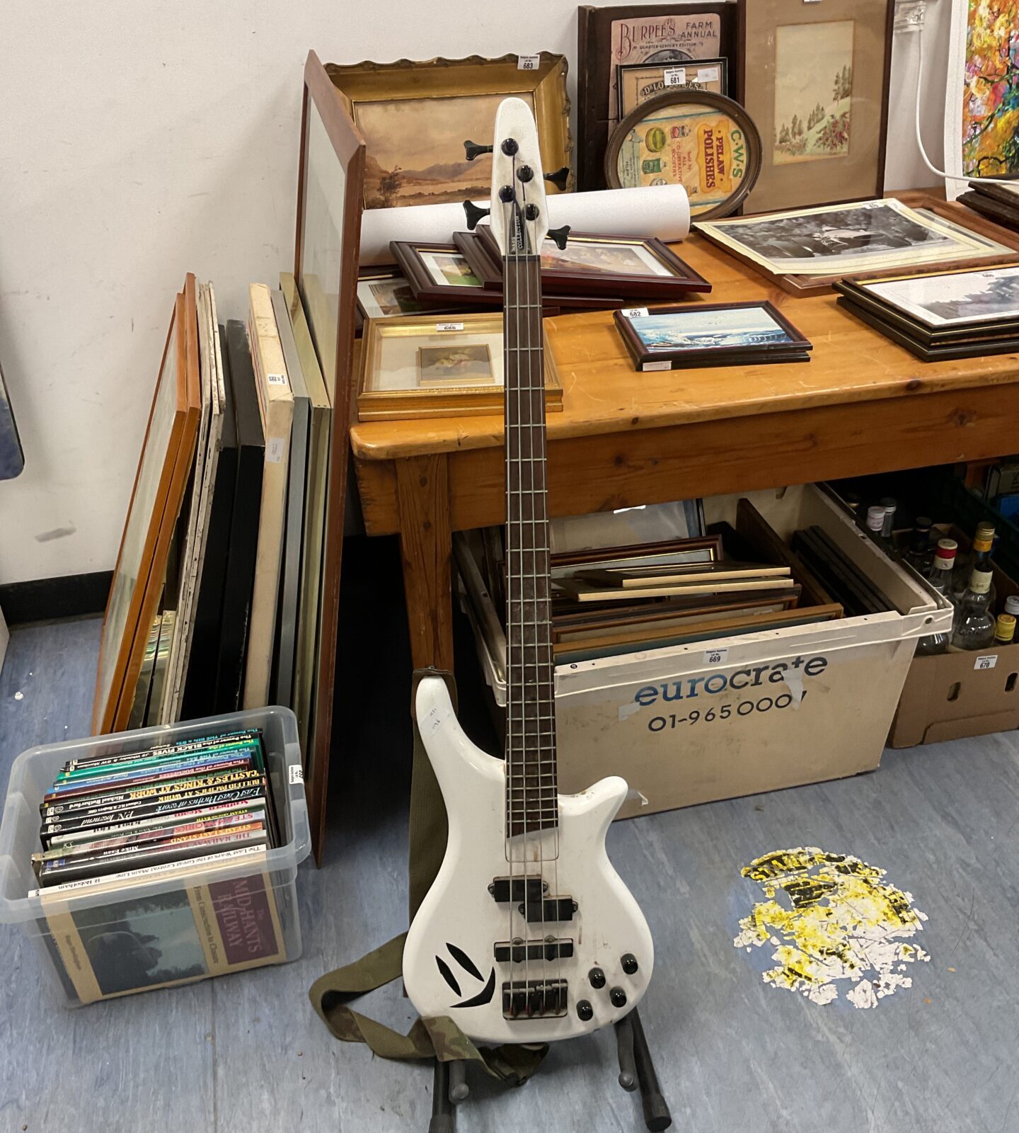 White electric bass guitar