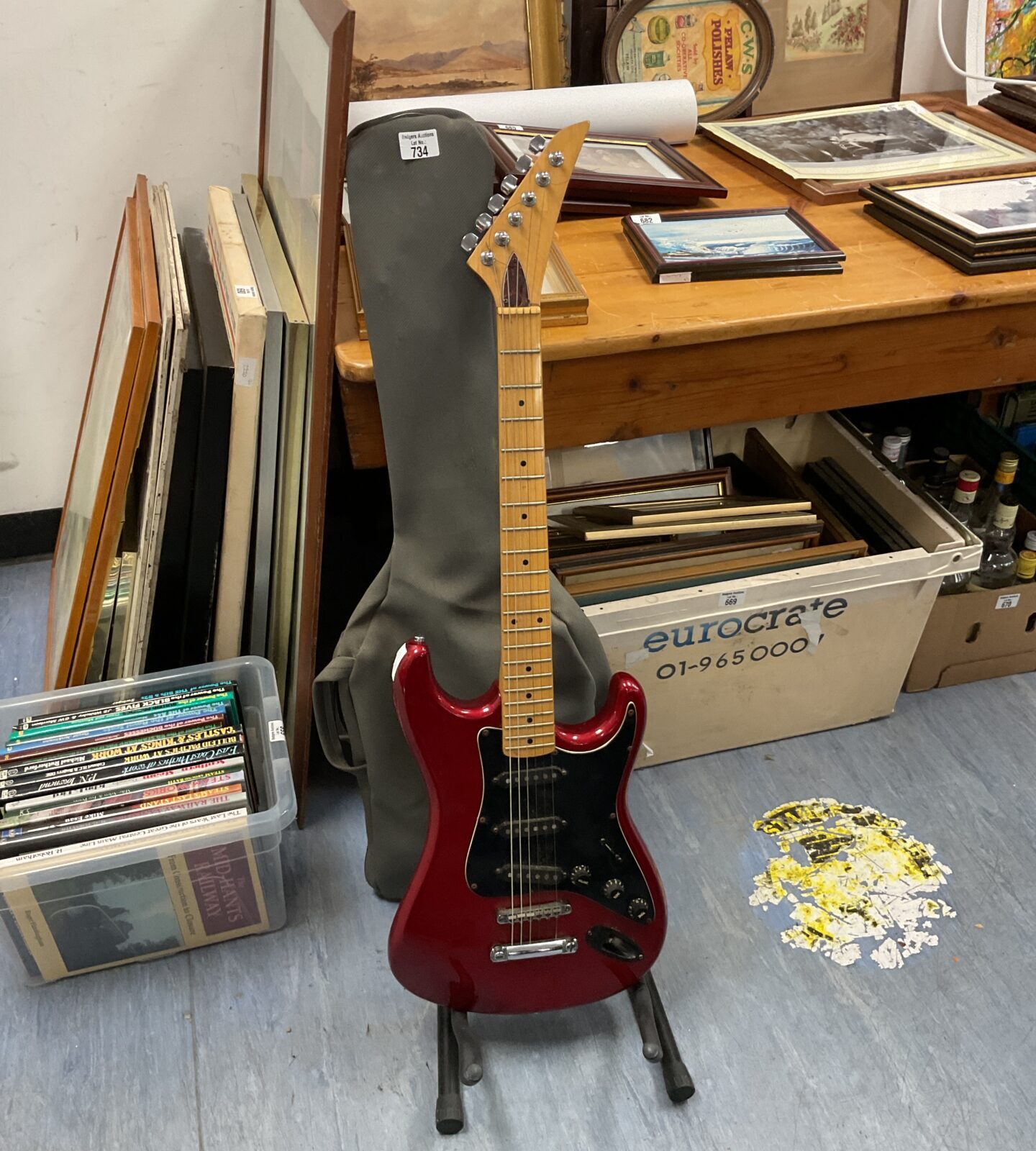 Red electric guitar with case