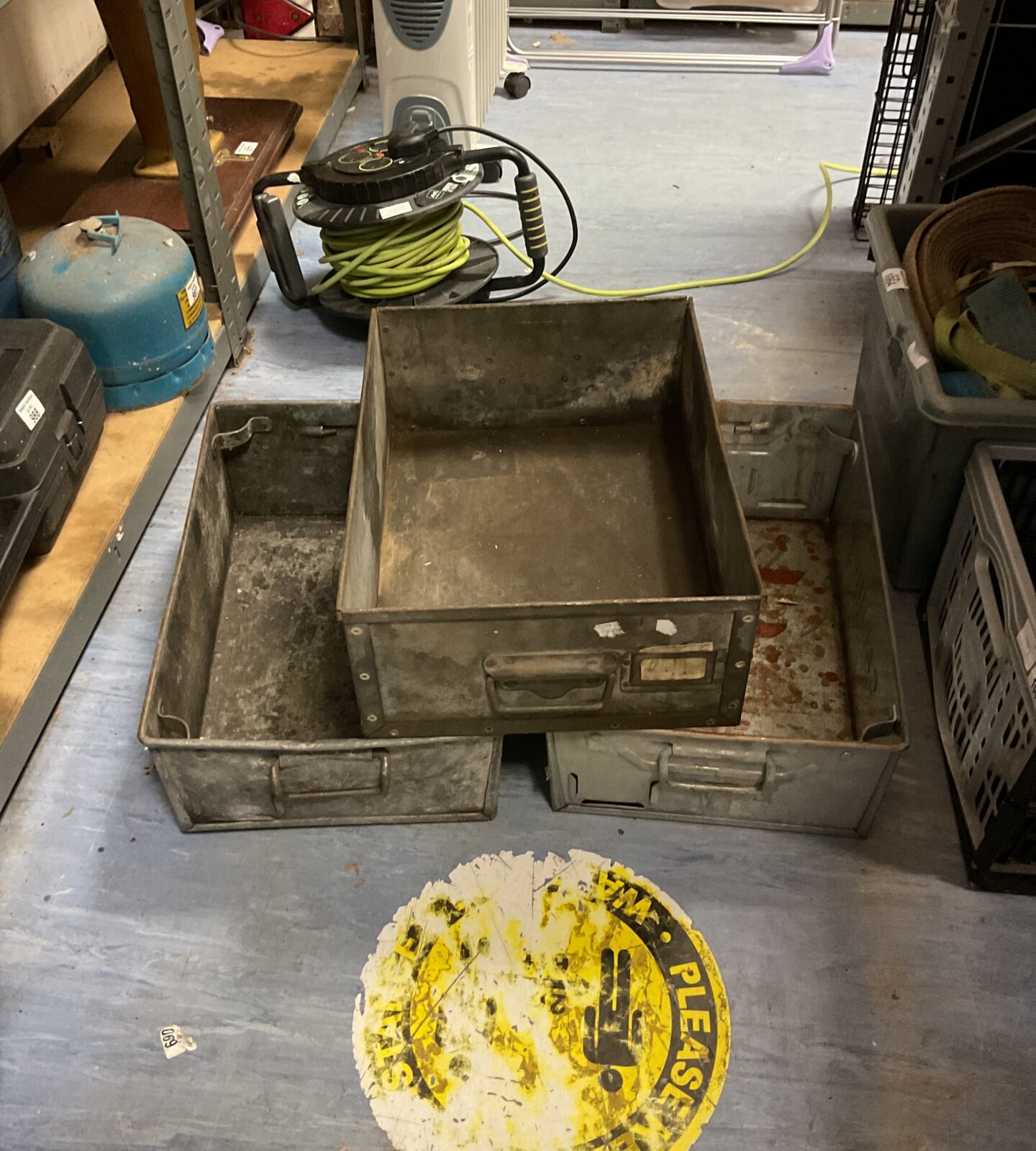 Three galvanised steel storage Bins