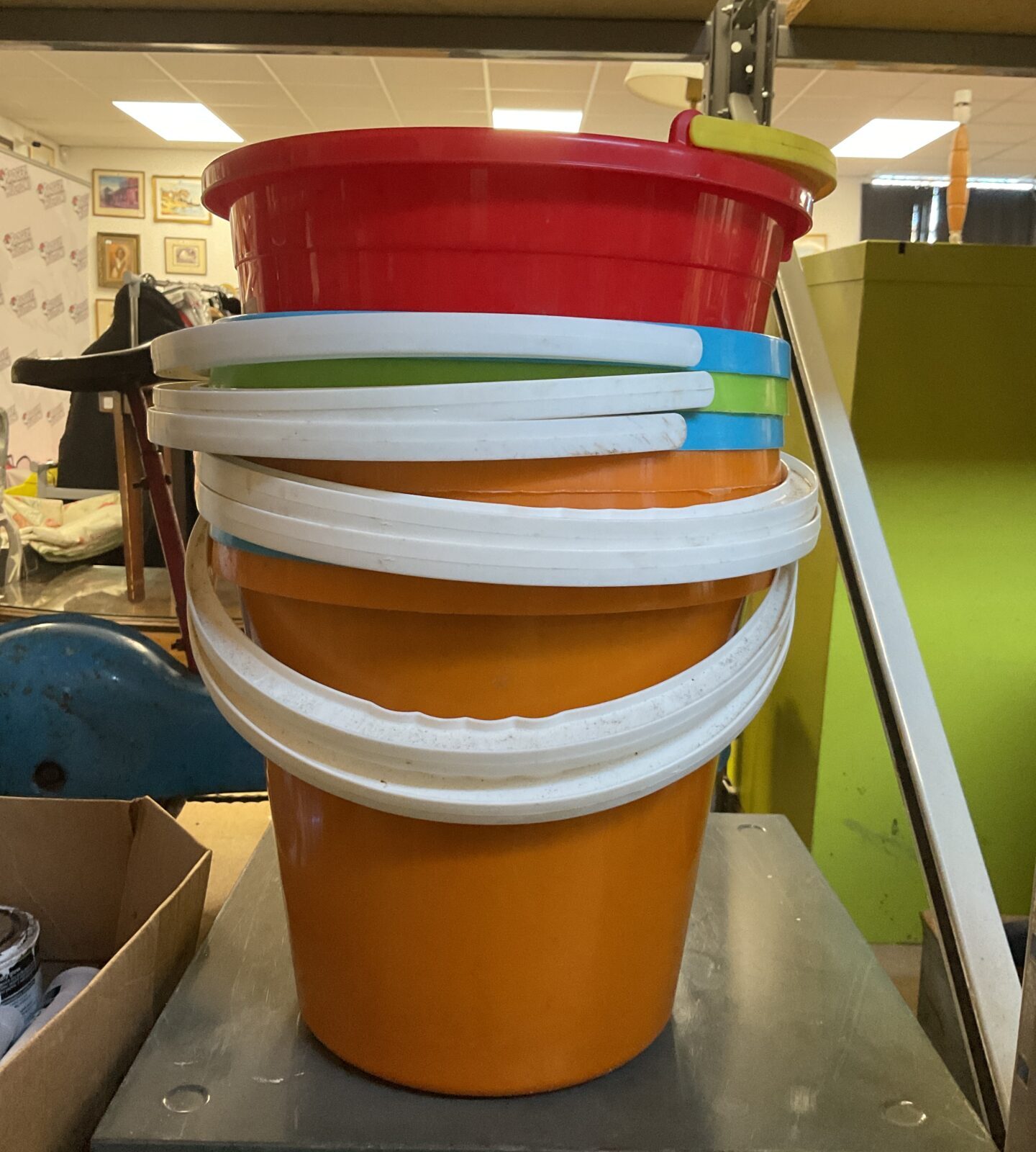 Eight plastic buckets