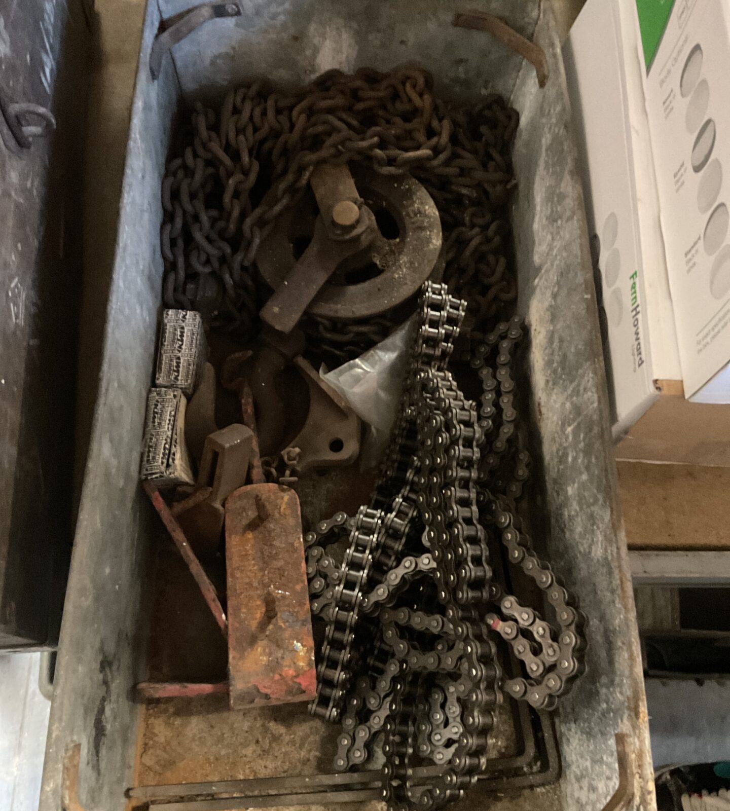 galvanised tray of chains & pulleys