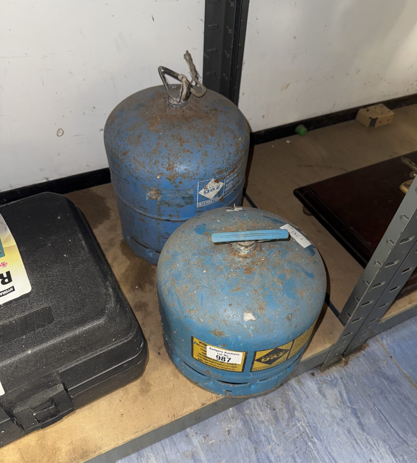 Two camping gas canisters - both feel empty