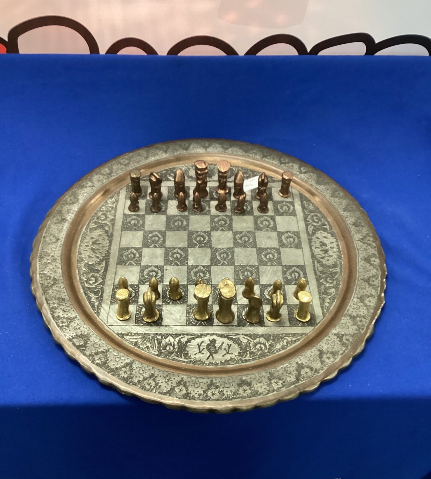 Metal Chessboard with incomplete Metal Chess Pieces