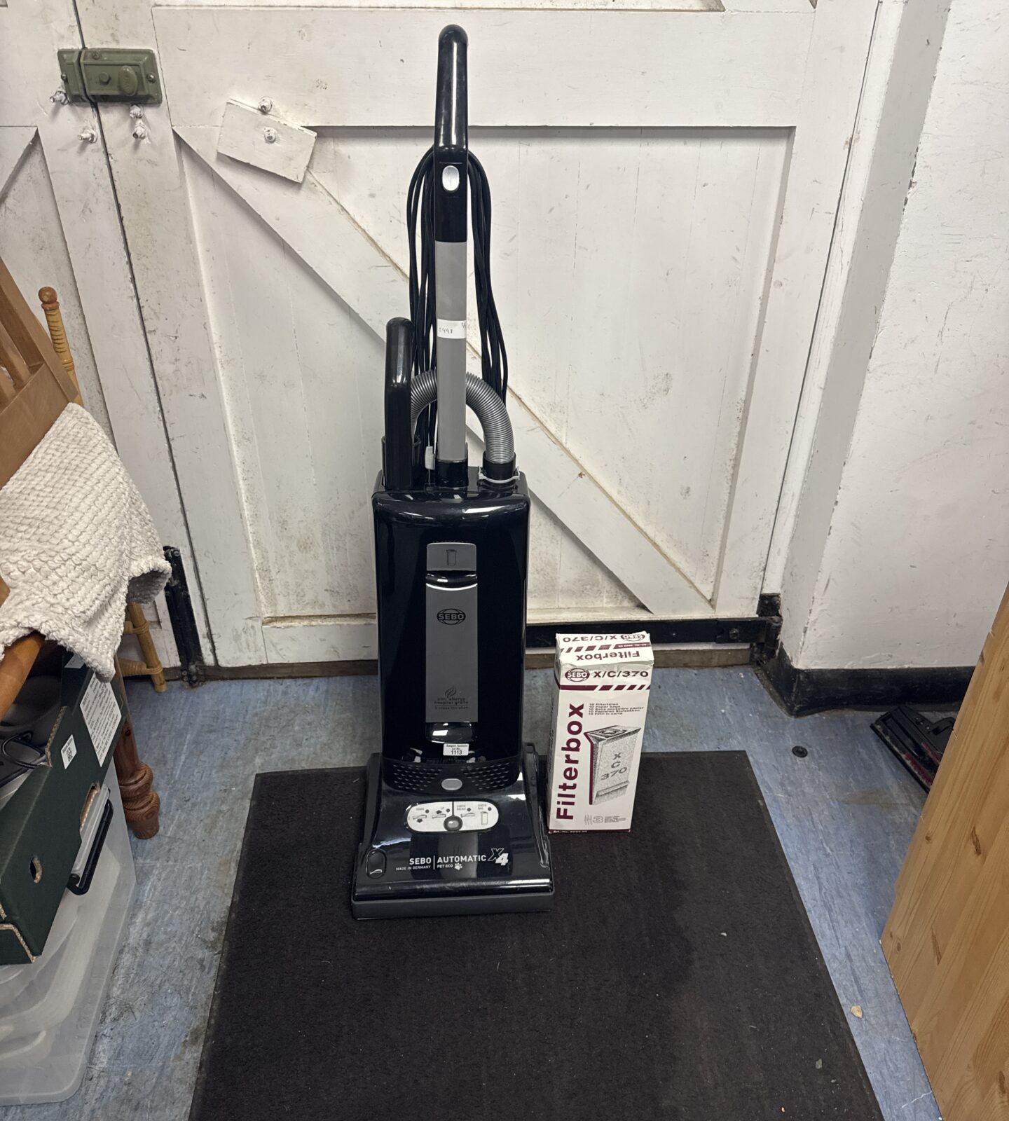 Sebo x4 hoover with box of spare bags - working