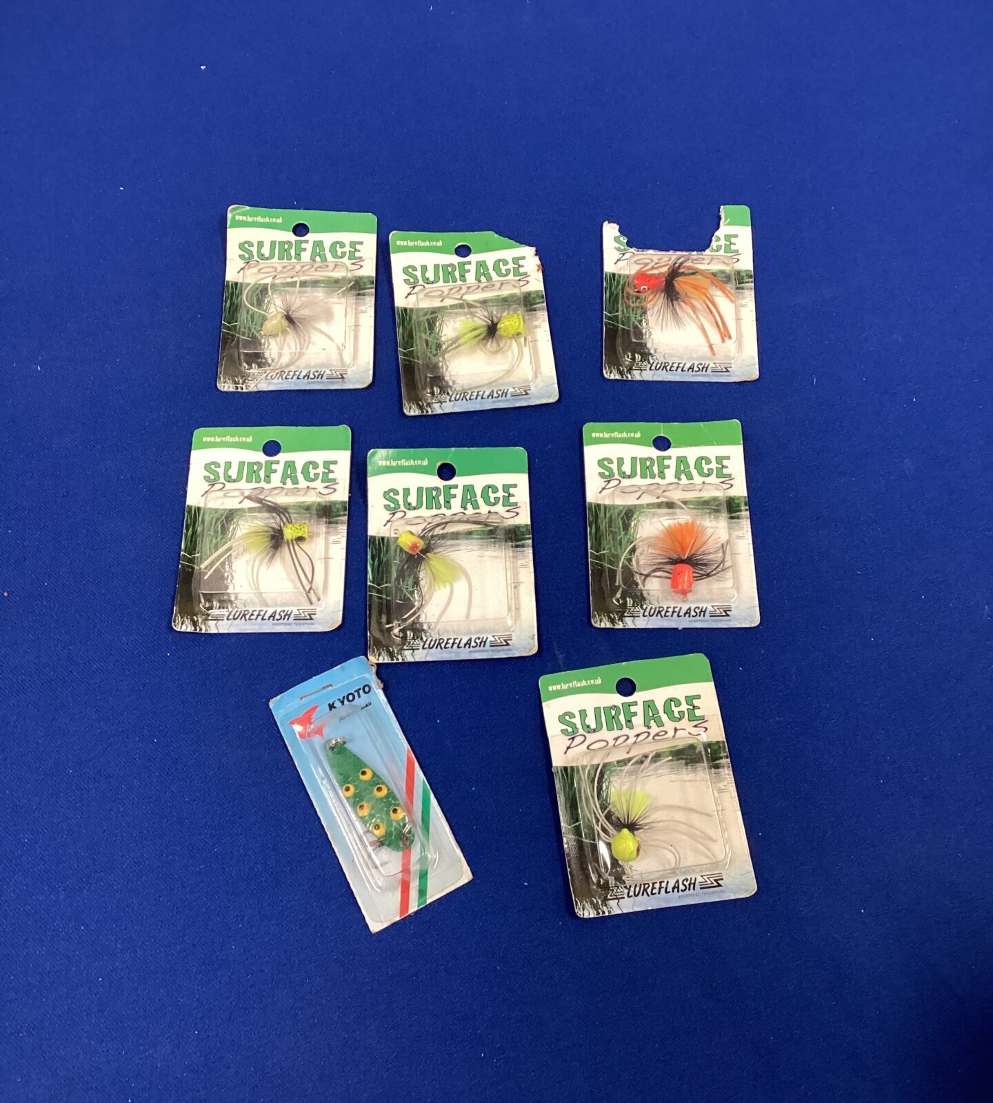 Selection of surface poppers fishings lures