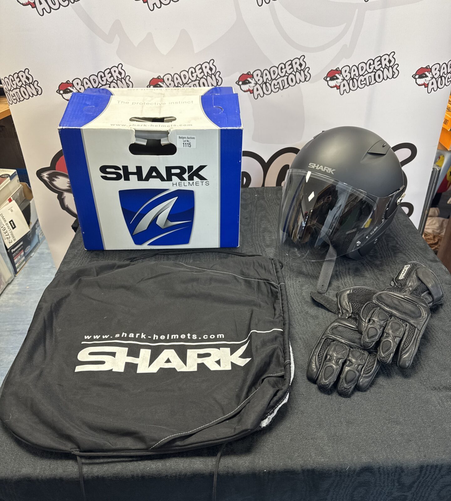 Shark motorcycle helmet size M (appears new) with pair of buffalo riding gloves size S