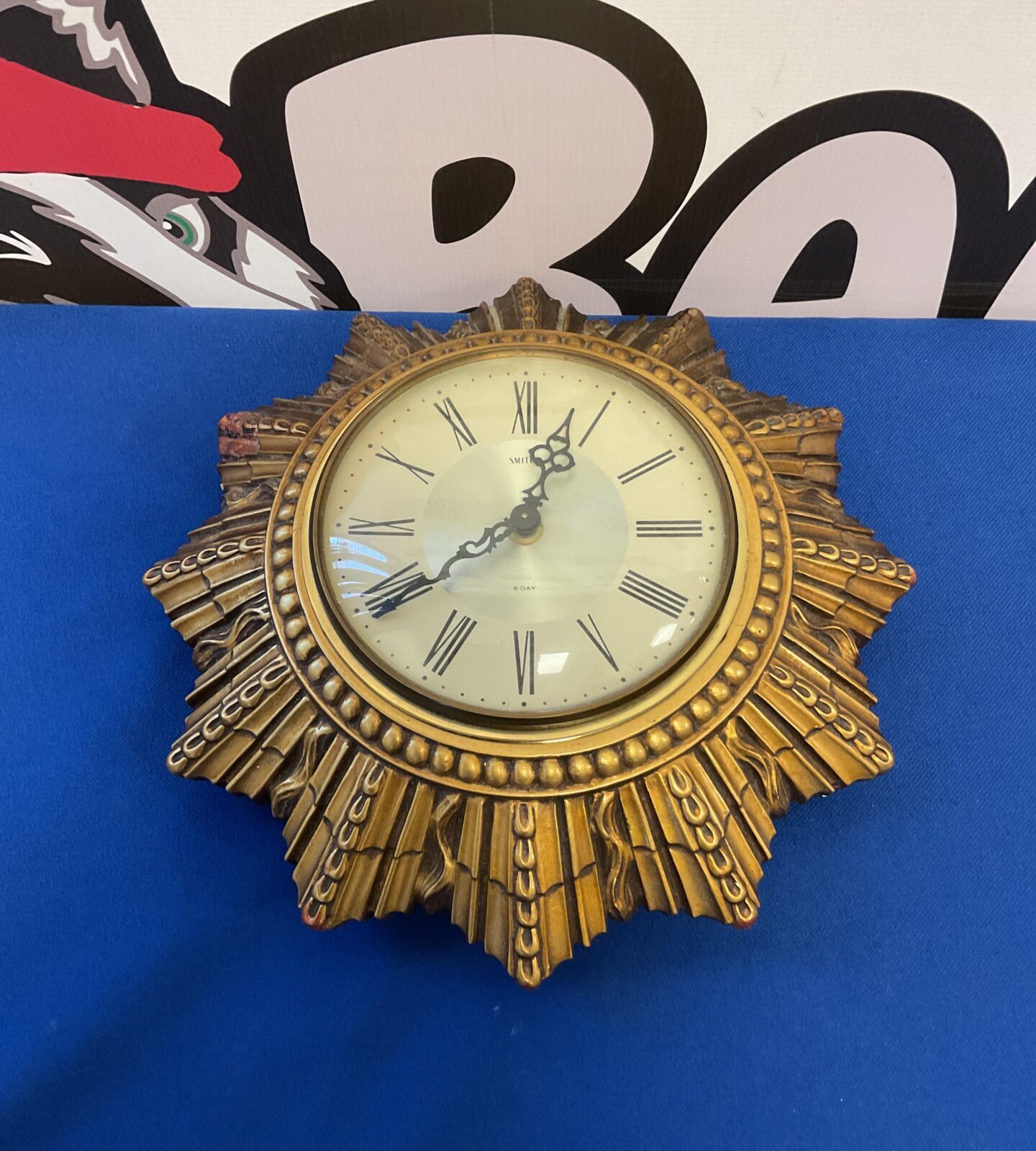 Smiths 8 day floating balance sunburst wall clock (needs attention)